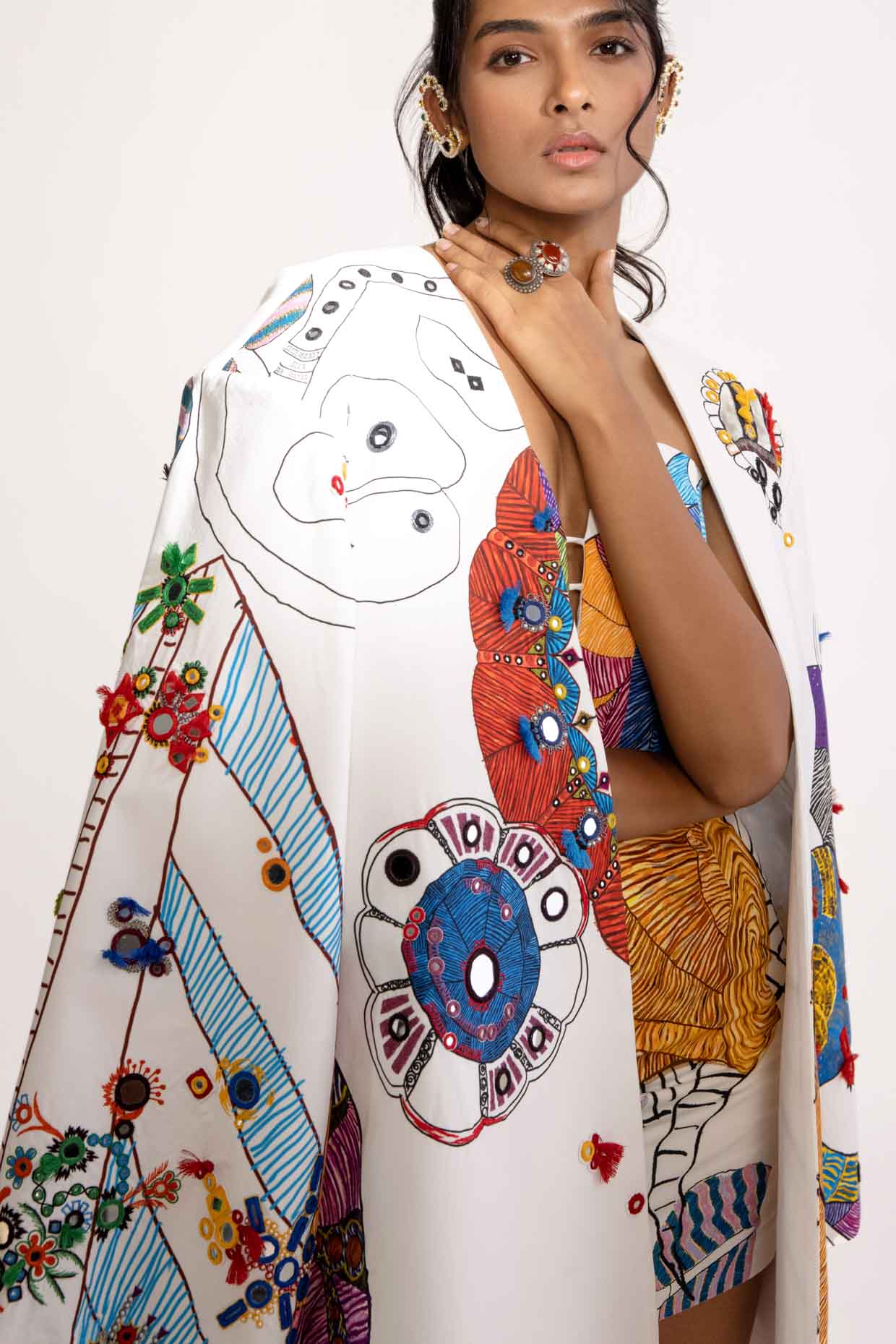A model showcasing Sefina Jacket Tribal Print Oversized Collared Blazer by Saaksha And Kinni from Saaksha And Kinni's collection