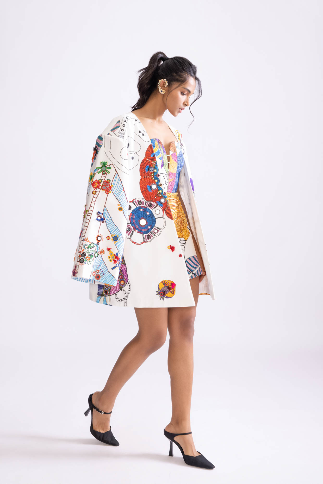 A model showcasing Sefina Jacket Tribal Print Oversized Collared Blazer by Saaksha And Kinni from Saaksha And Kinni's collection