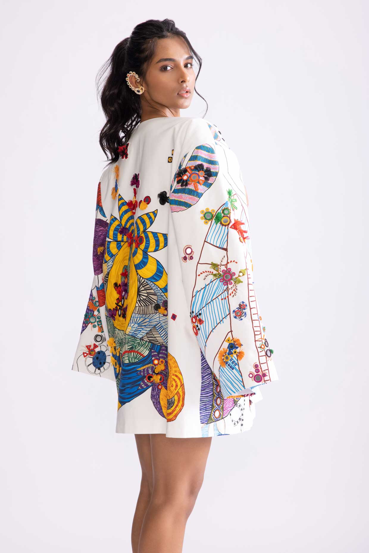 A model showcasing Sefina Jacket Tribal Print Oversized Collared Blazer by Saaksha And Kinni from Saaksha And Kinni's collection