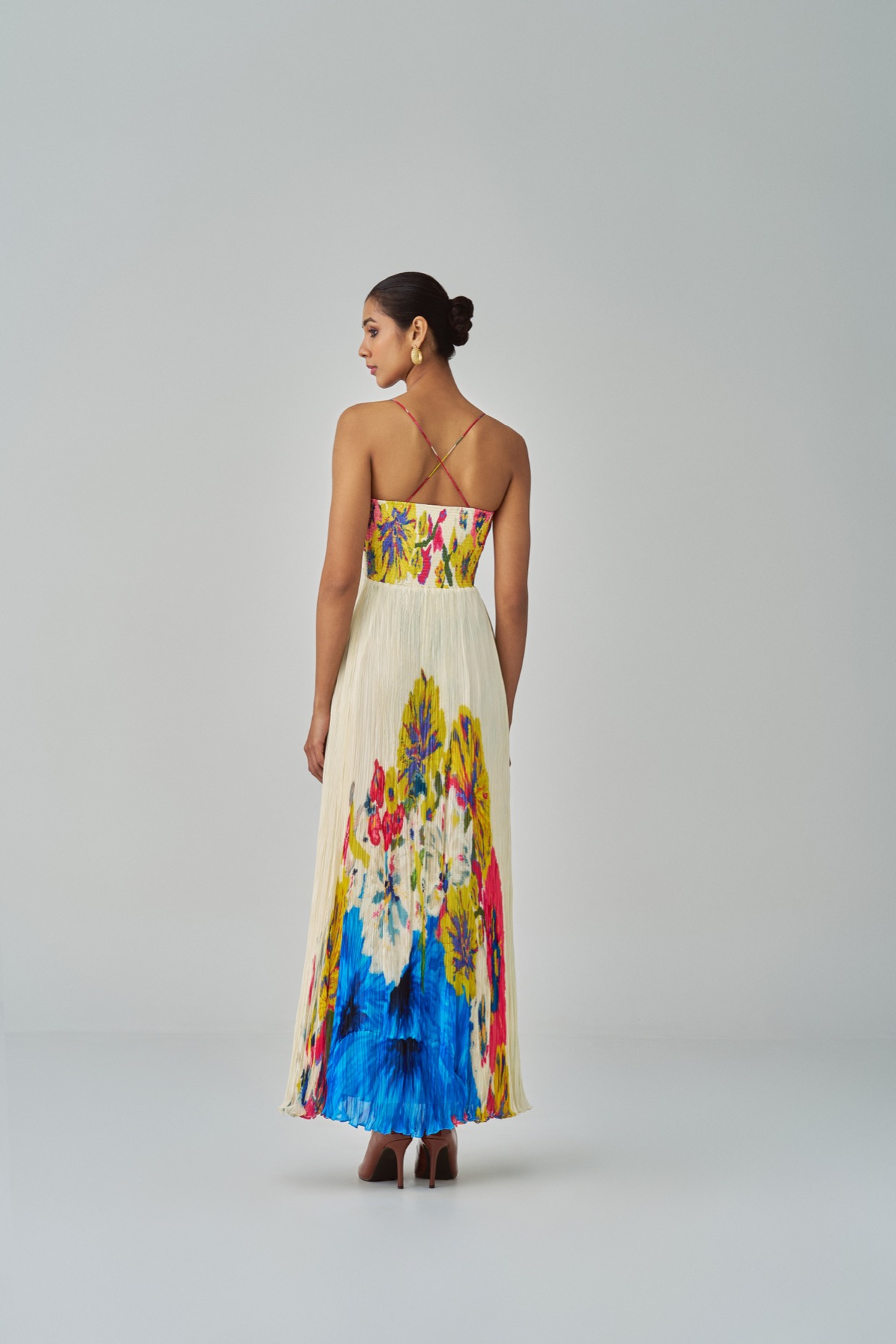 A model showcasing Chrissy Dress Floral Print Maxi Dress by Saaksha And Kinni from Saaksha And Kinni's collection