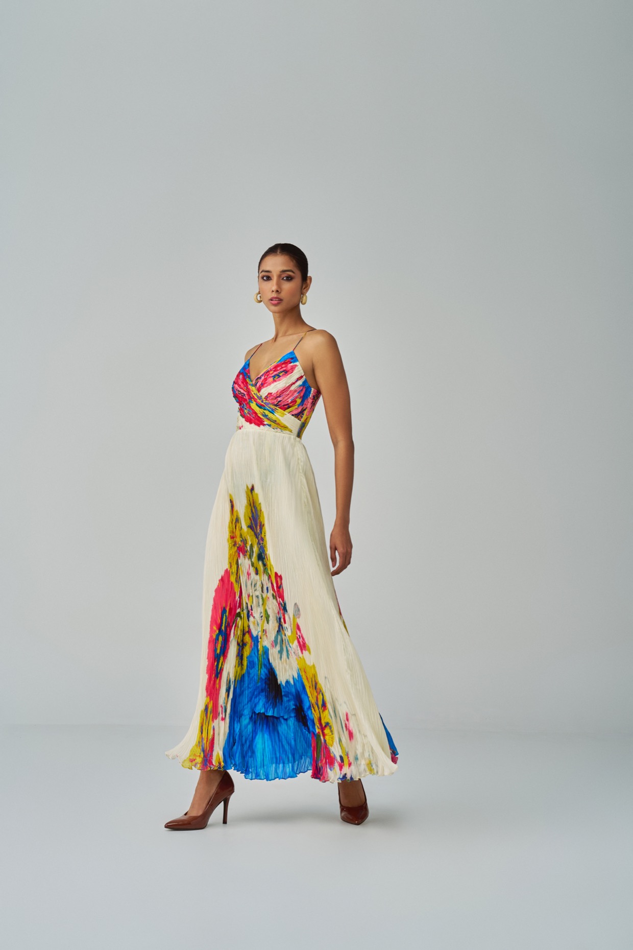 A model showcasing Chrissy Dress Floral Print Maxi Dress by Saaksha And Kinni from Saaksha And Kinni's collection