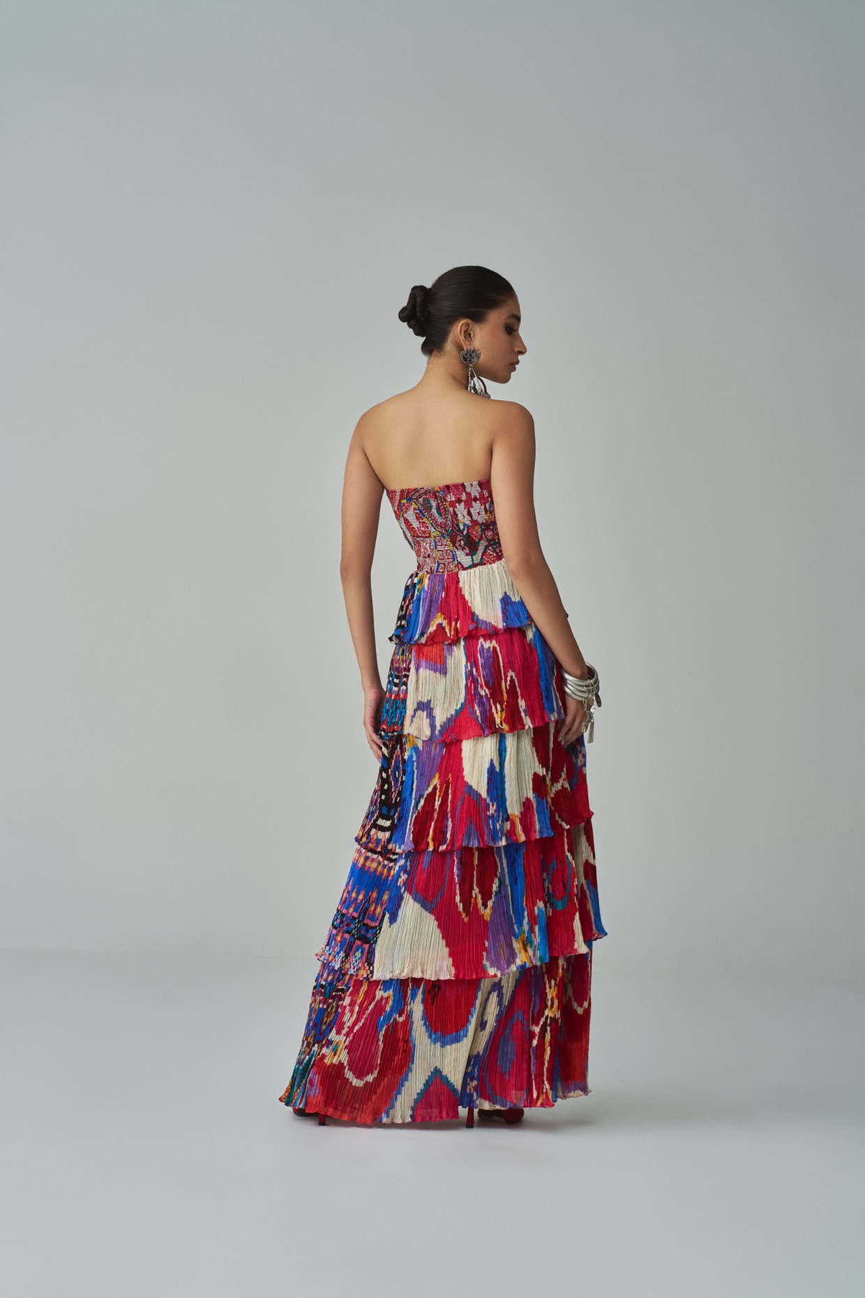A model showcasing Helena Dress Abstracted Printed Dress by Saaksha And Kinni from Saaksha And Kinni's collection