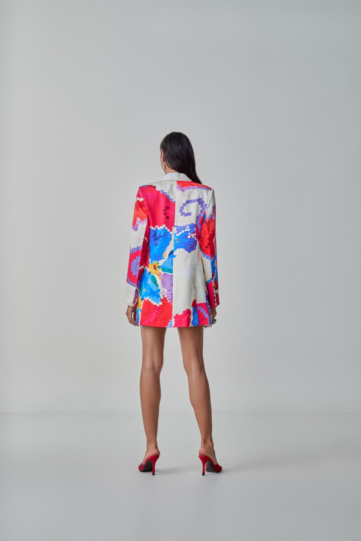 A model showcasing Millie Blazer Red Pink Oversized Blazer by Saaksha And Kinni from Saaksha And Kinni's collection