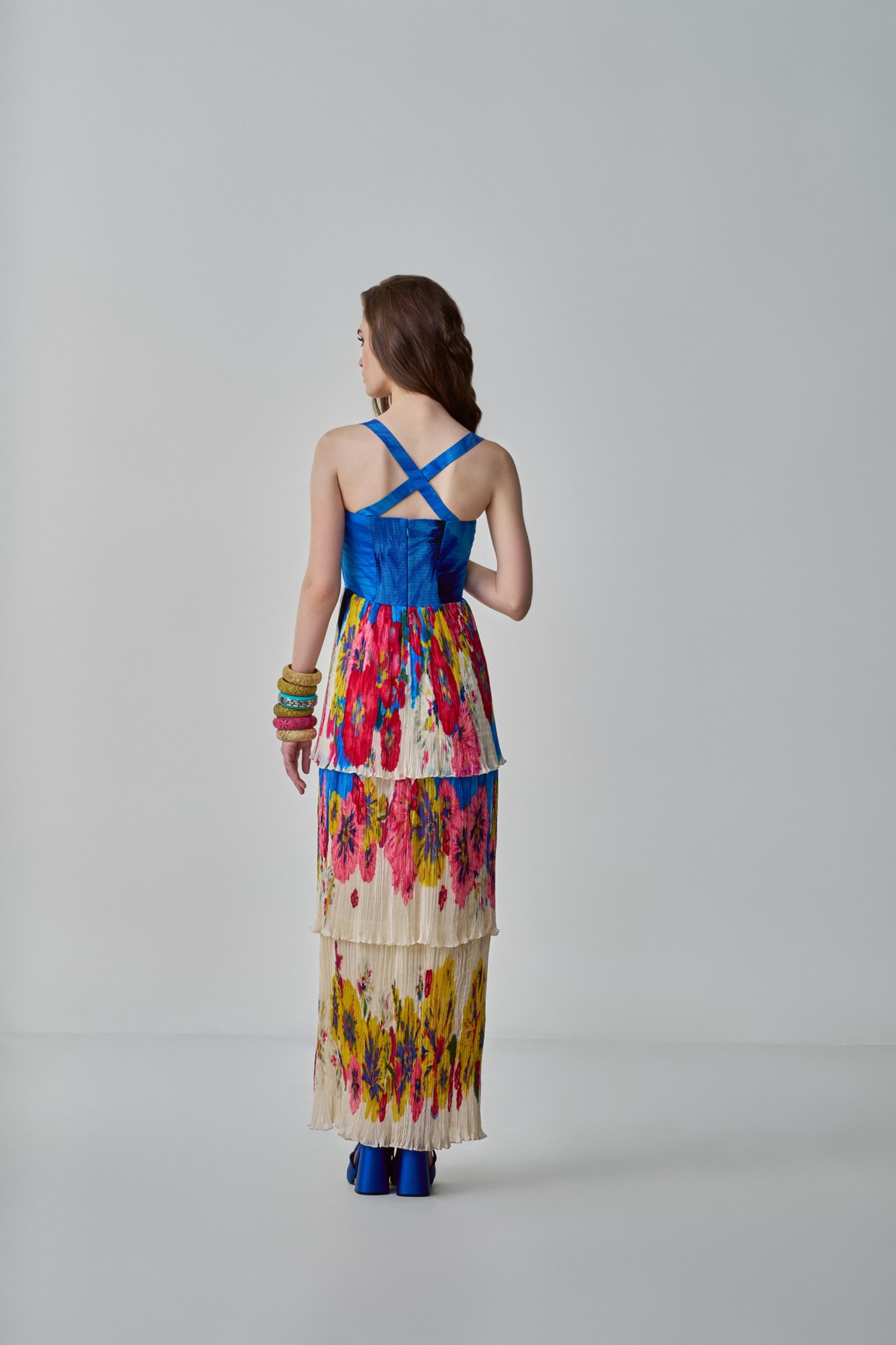 A model showcasing Missy Dress Floral Tiered Maxi Dress by Saaksha And Kinni from Saaksha And Kinni's collection