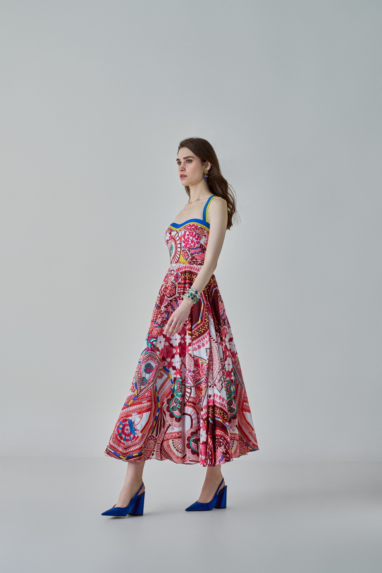A model showcasing Marilyn Dress Paisley Print Flared Frock by Saaksha And Kinni from Saaksha And Kinni's collection