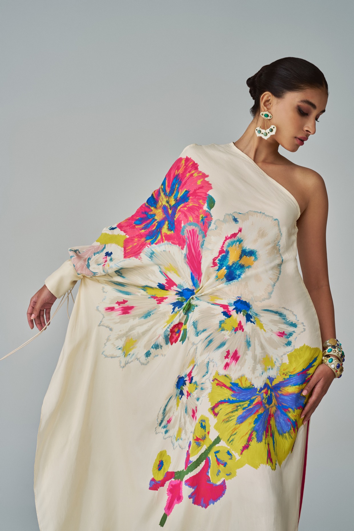 A model showcasing Alana Kaftan Ivory Floral Kaftan by Saaksha And Kinni from Saaksha And Kinni's collection