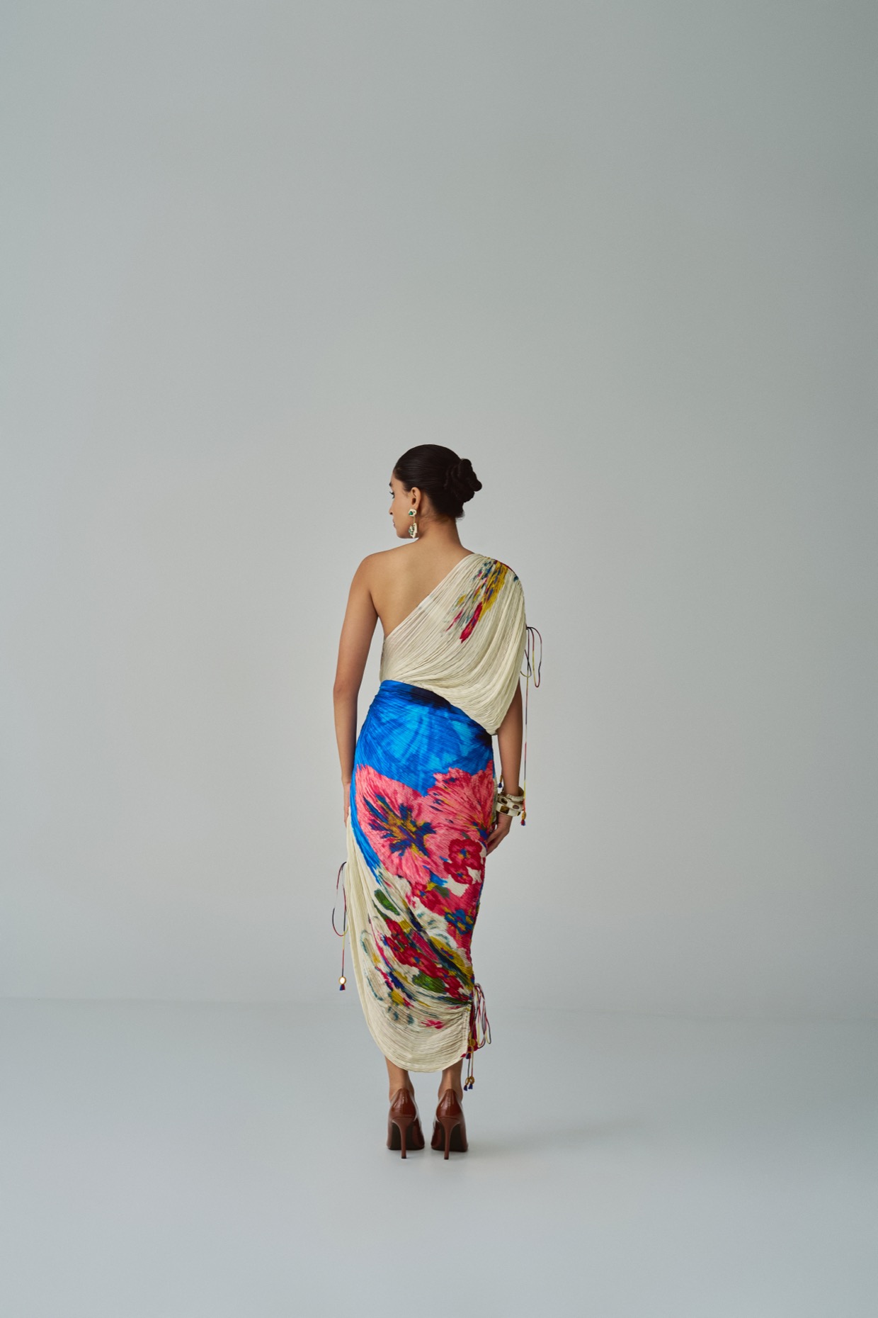 A model showcasing Mira Dress Ivory Floral Dress by Saaksha And Kinni from Saaksha And Kinni's collection