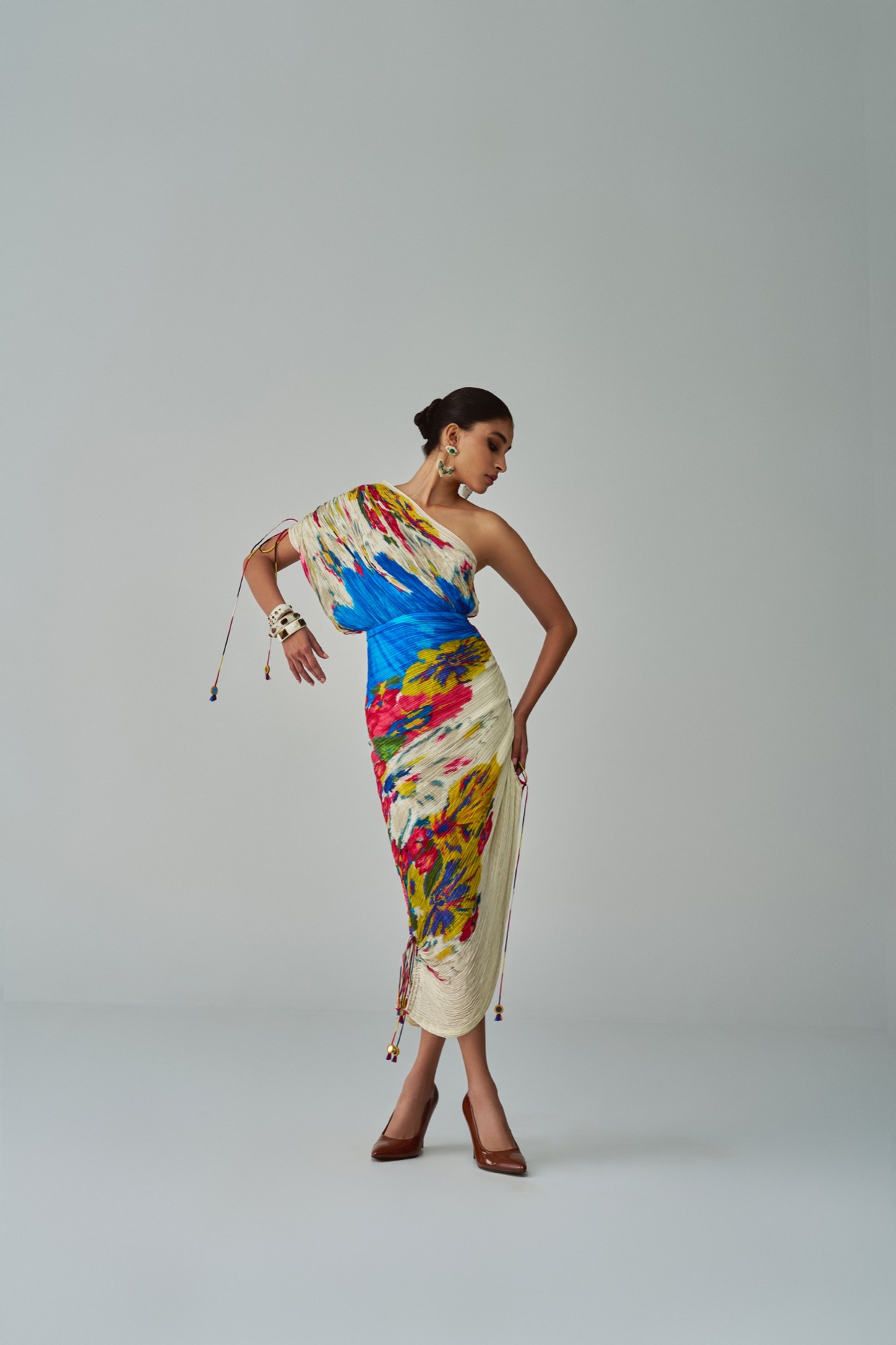 A model showcasing Mira Dress Ivory Floral Dress by Saaksha And Kinni from Saaksha And Kinni's collection