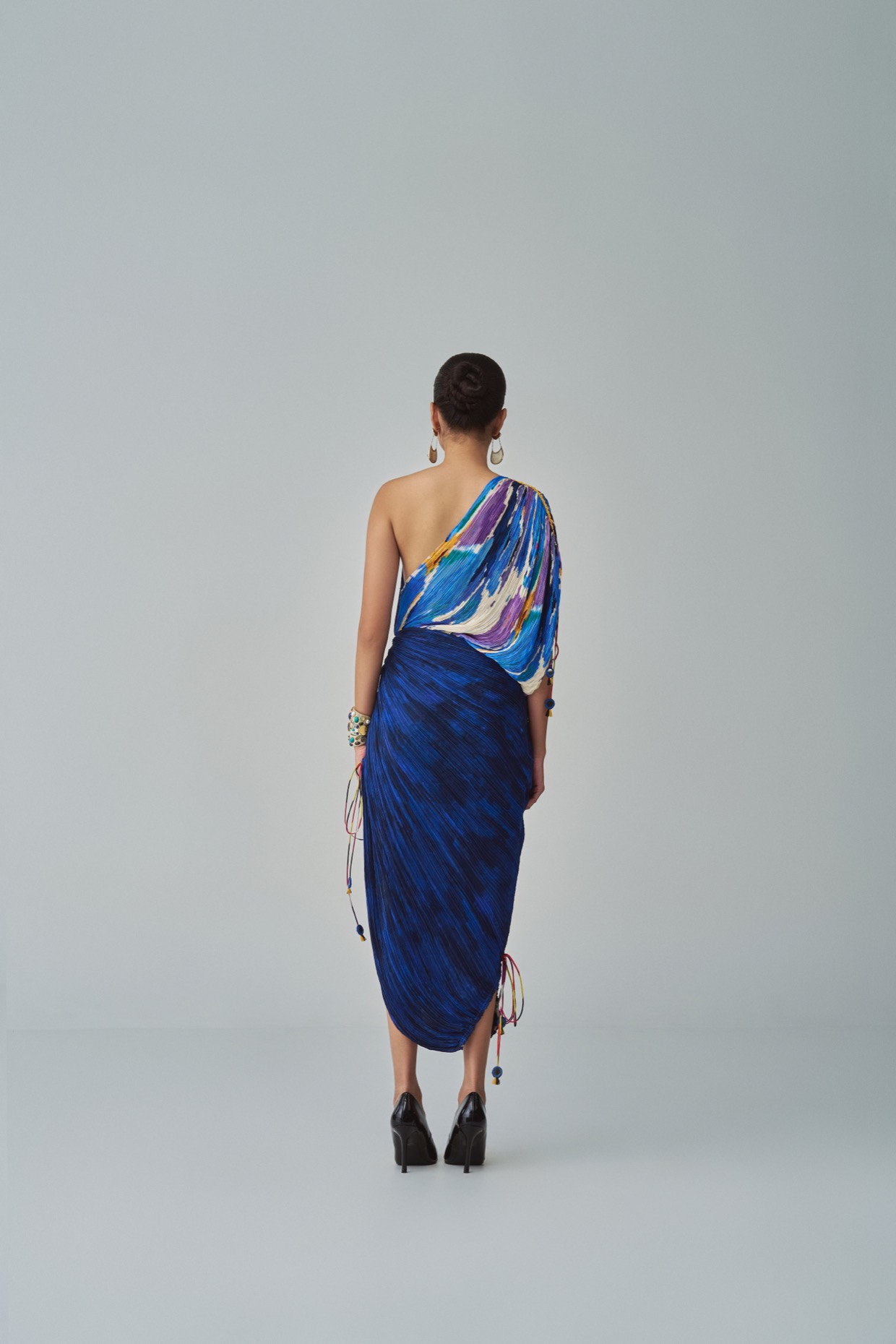 A model showcasing Mira Dress Blue One Shoulder Dress by Saaksha And Kinni from Saaksha And Kinni's collection