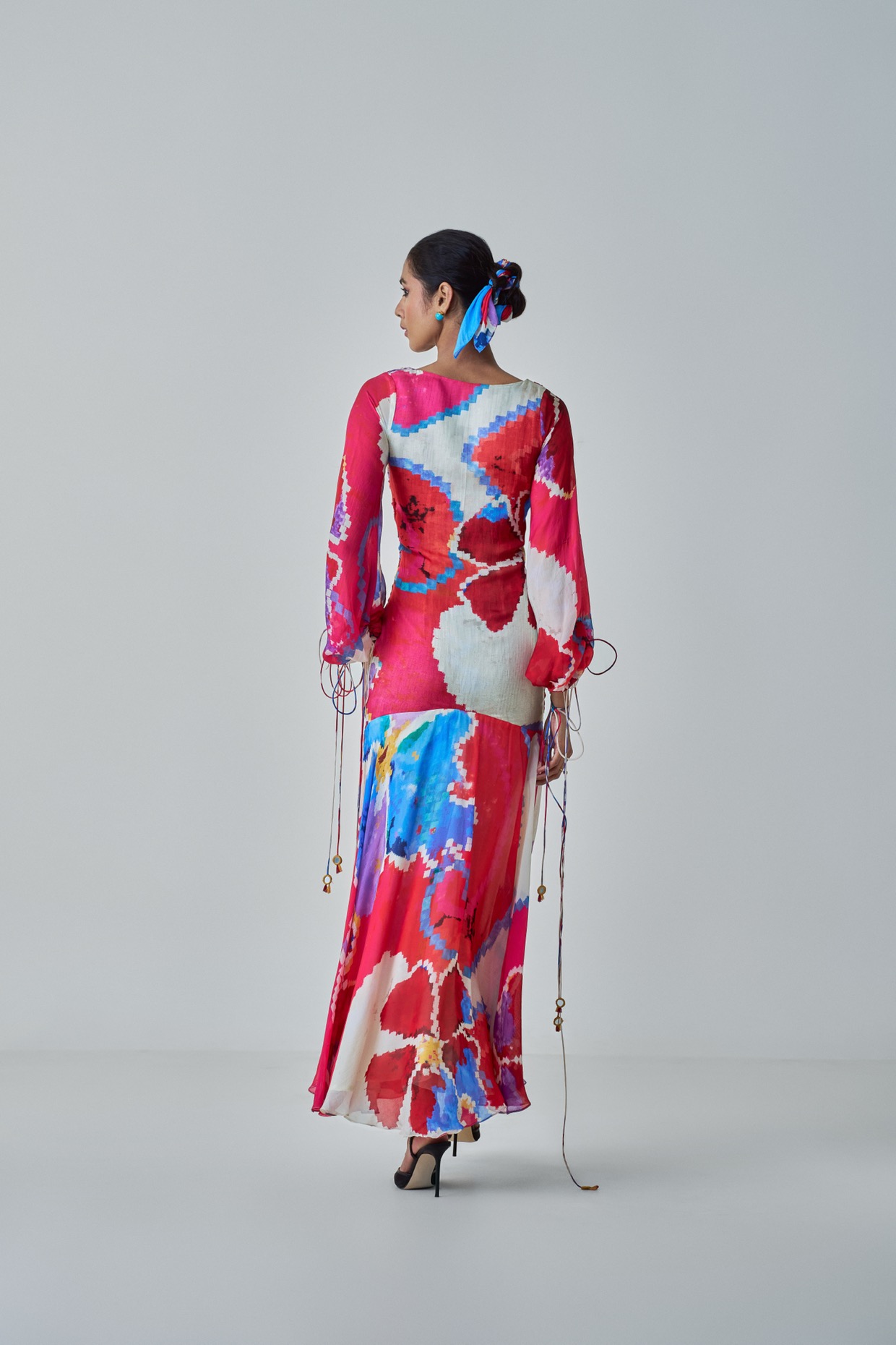 A model showcasing Ariel Dress Pink Red Maxi Dress by Saaksha And Kinni from Saaksha And Kinni's collection