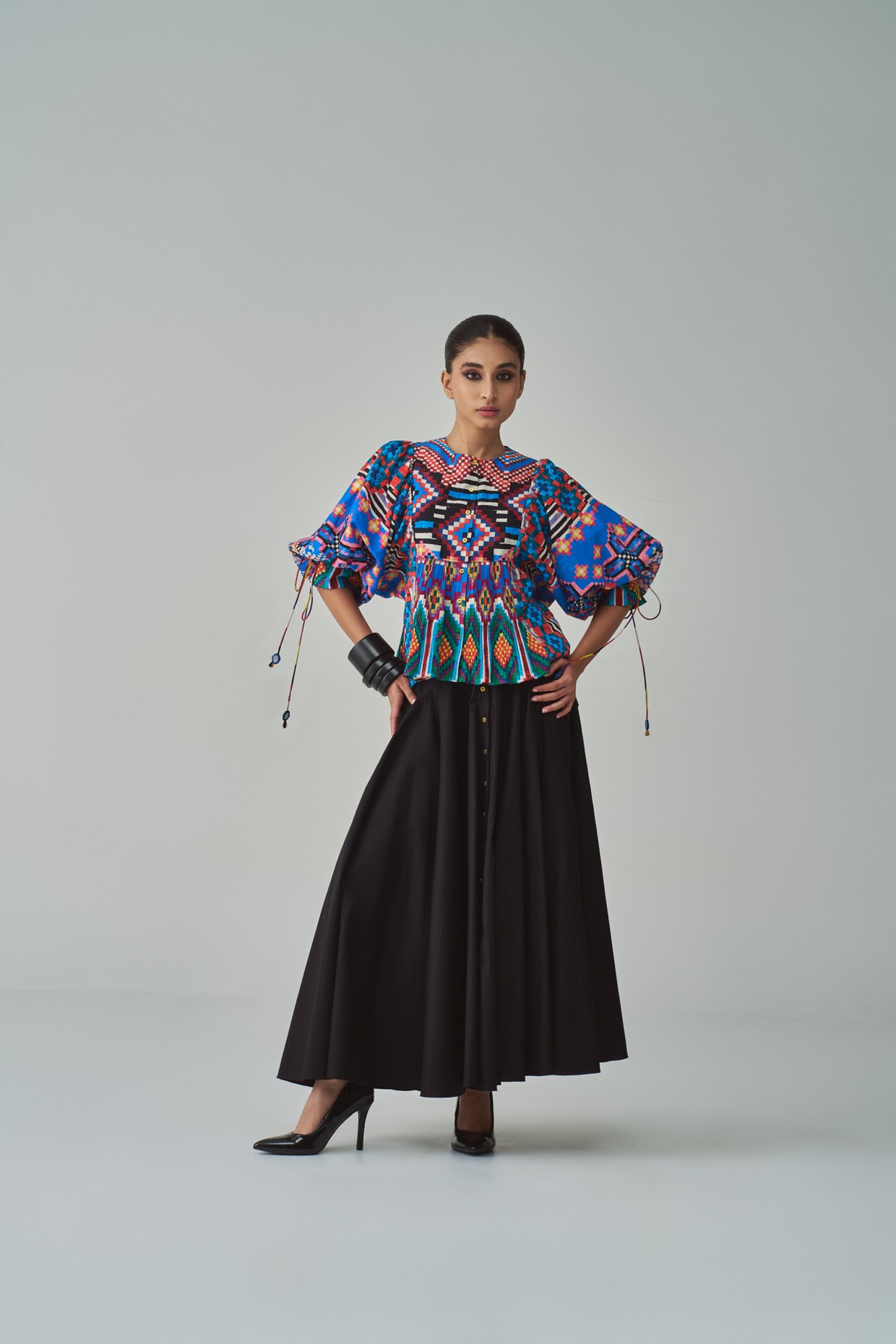 A model showcasing Blue Tanya Blouse by Saaksha And Kinni from Saaksha And Kinni's collection