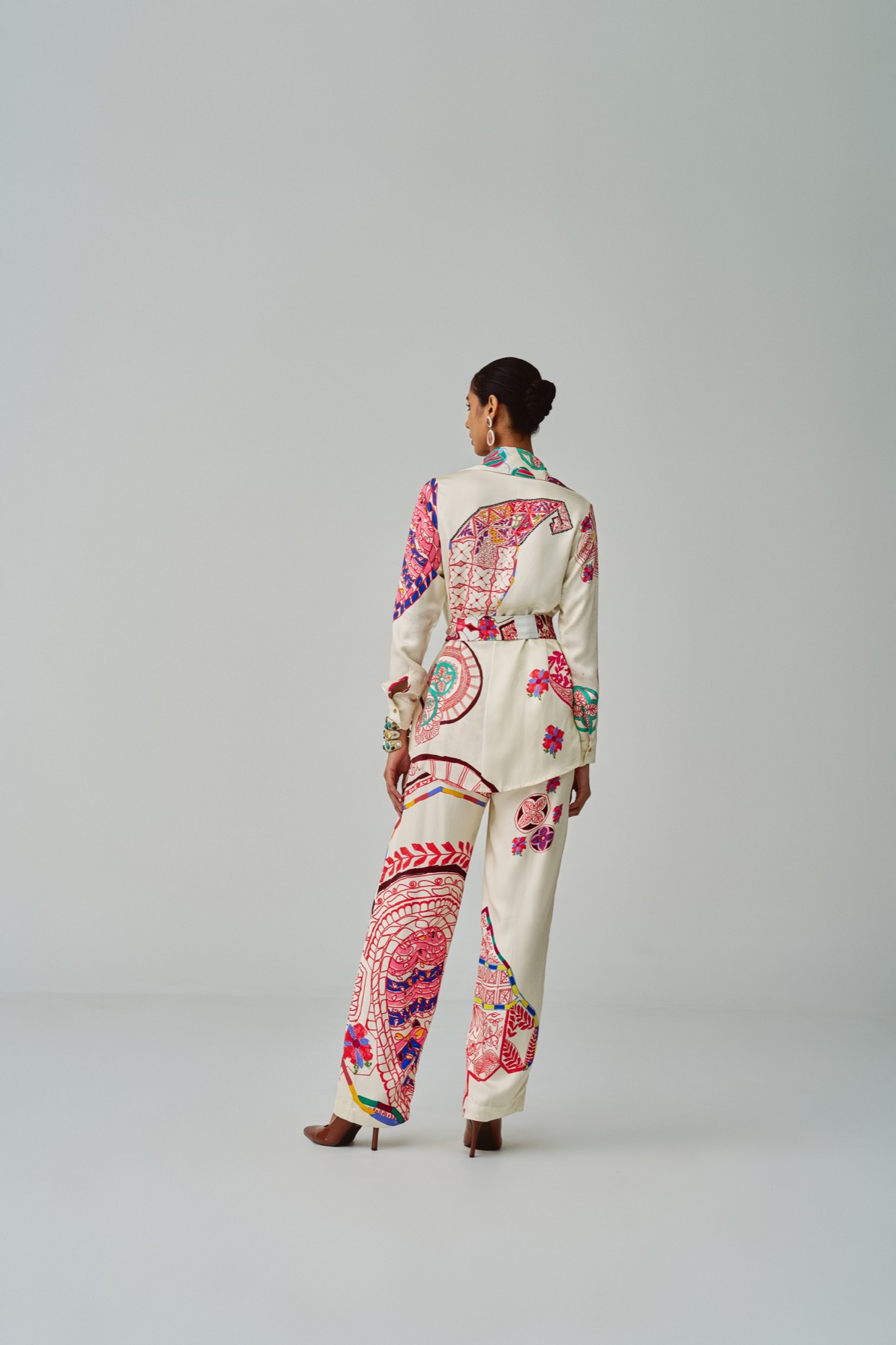 A model showcasing Malaika Jacket Ivory Collared Jacket by Saaksha And Kinni from Saaksha And Kinni's collection