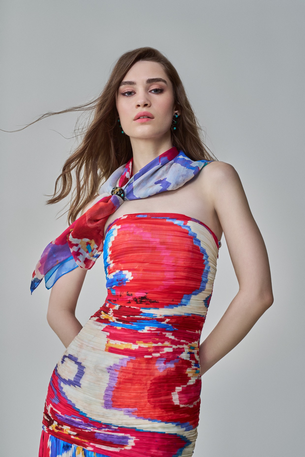 A model showcasing Pink Red Jennifer Dress by Saaksha And Kinni from Saaksha And Kinni's collection A model showcasing Pink Red Jennifer Dress by Saaksha And Kinni from Saaksha And Kinni's collection