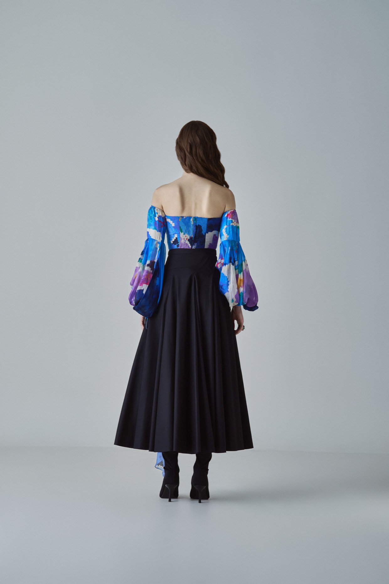 A model showcasing Taloola Blouse Blue Cold Shoulder Blouse by Saaksha And Kinni from Saaksha And Kinni's collection