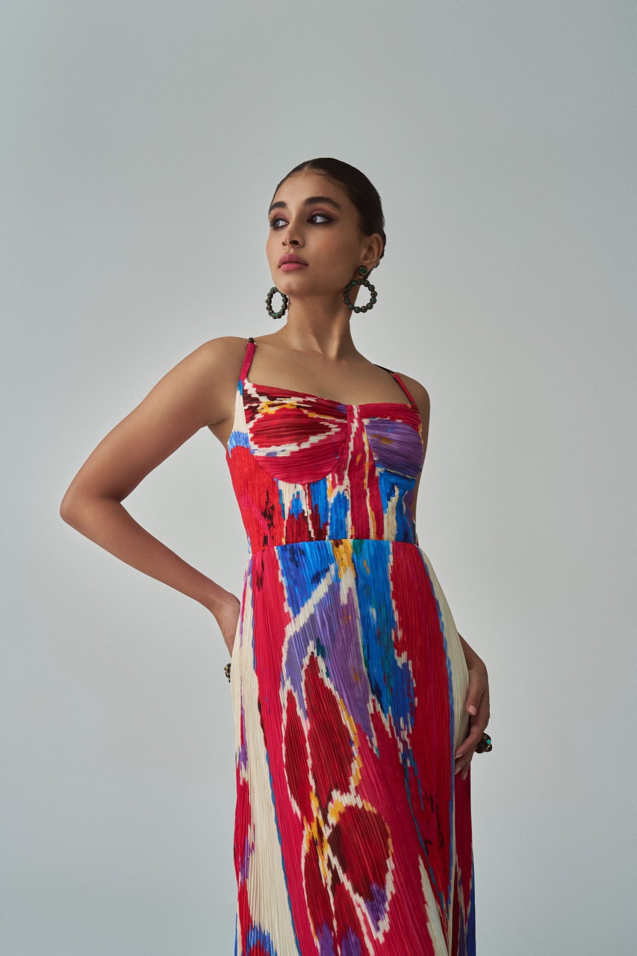 A model showcasing Kiara Dress Red Maxi Drsss by Saaksha And Kinni from Saaksha And Kinni's collection
