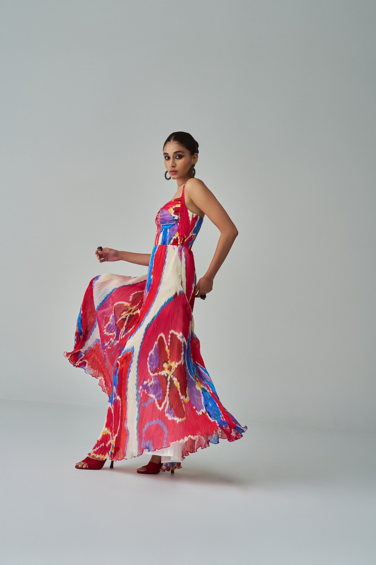 A model showcasing Kiara Dress Red Maxi Drsss by Saaksha And Kinni from Saaksha And Kinni's collection