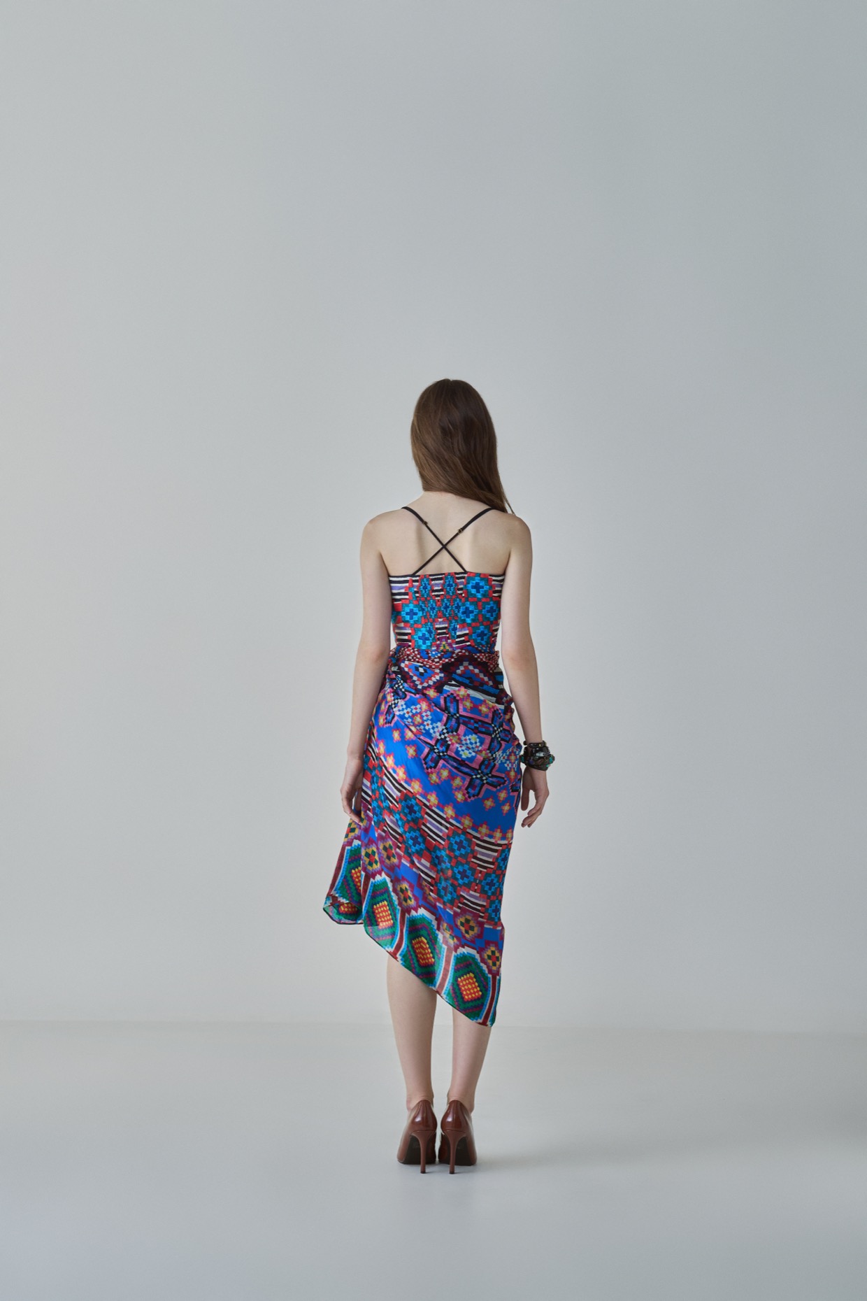 A model showcasing Dolly Dress Blue Midi Dress by Saaksha And Kinni from Saaksha And Kinni's collection