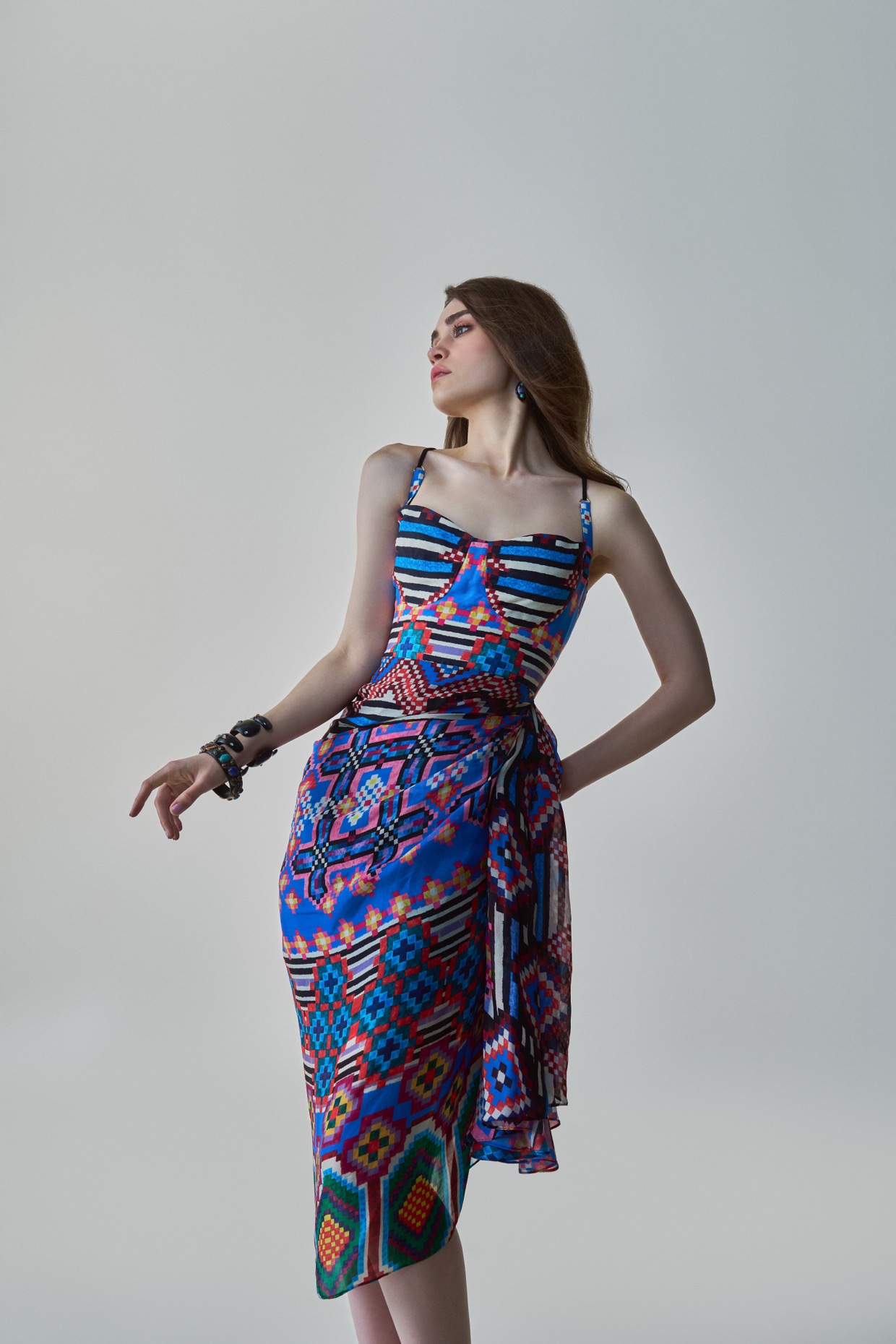 A model showcasing Dolly Dress Blue Midi Dress by Saaksha And Kinni from Saaksha And Kinni's collection
