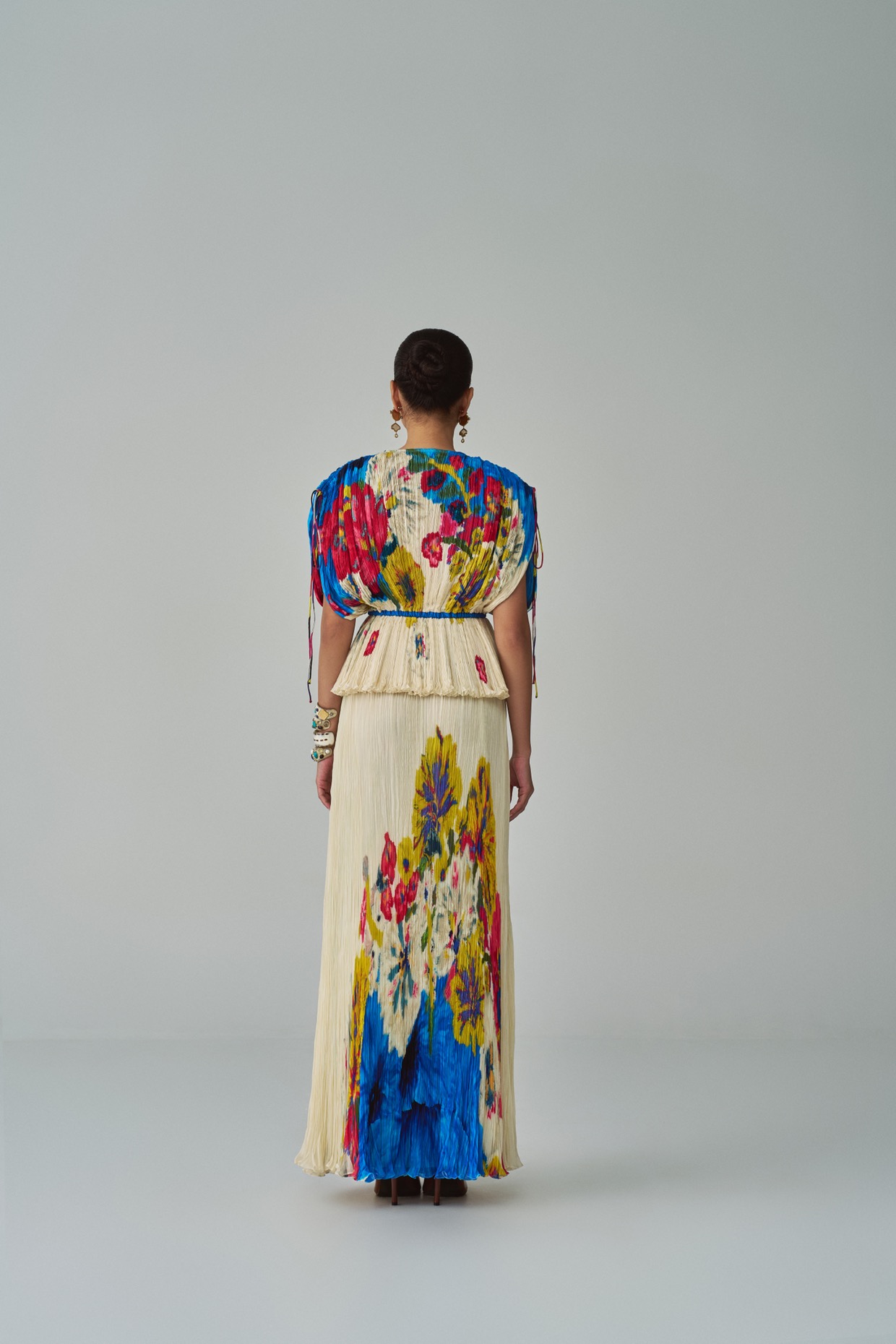A model showcasing Monica Blouse Ivory Kaftan Blouse by Saaksha And Kinni from Saaksha And Kinni's collection