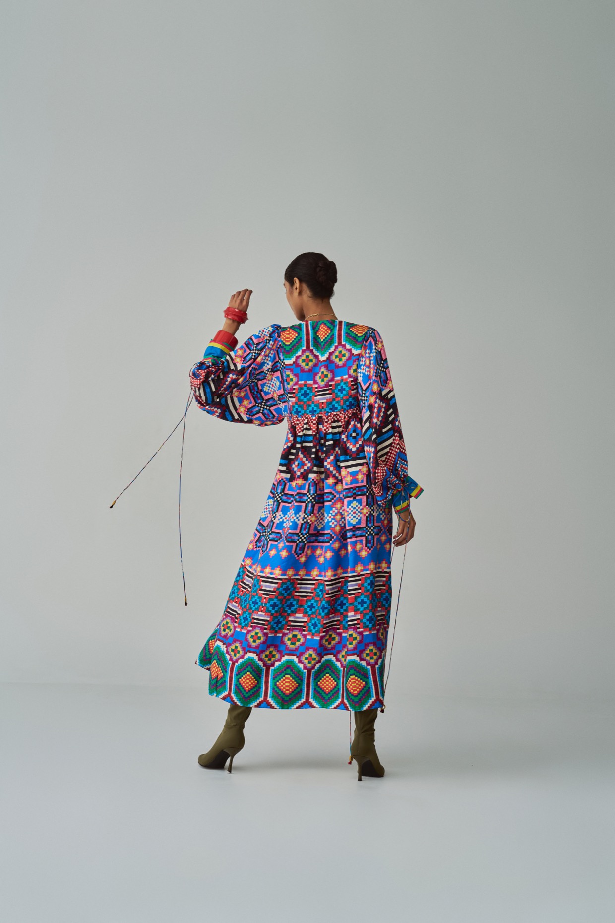 A model showcasing Blue Sara Dress by Saaksha And Kinni from Saaksha And Kinni's collection