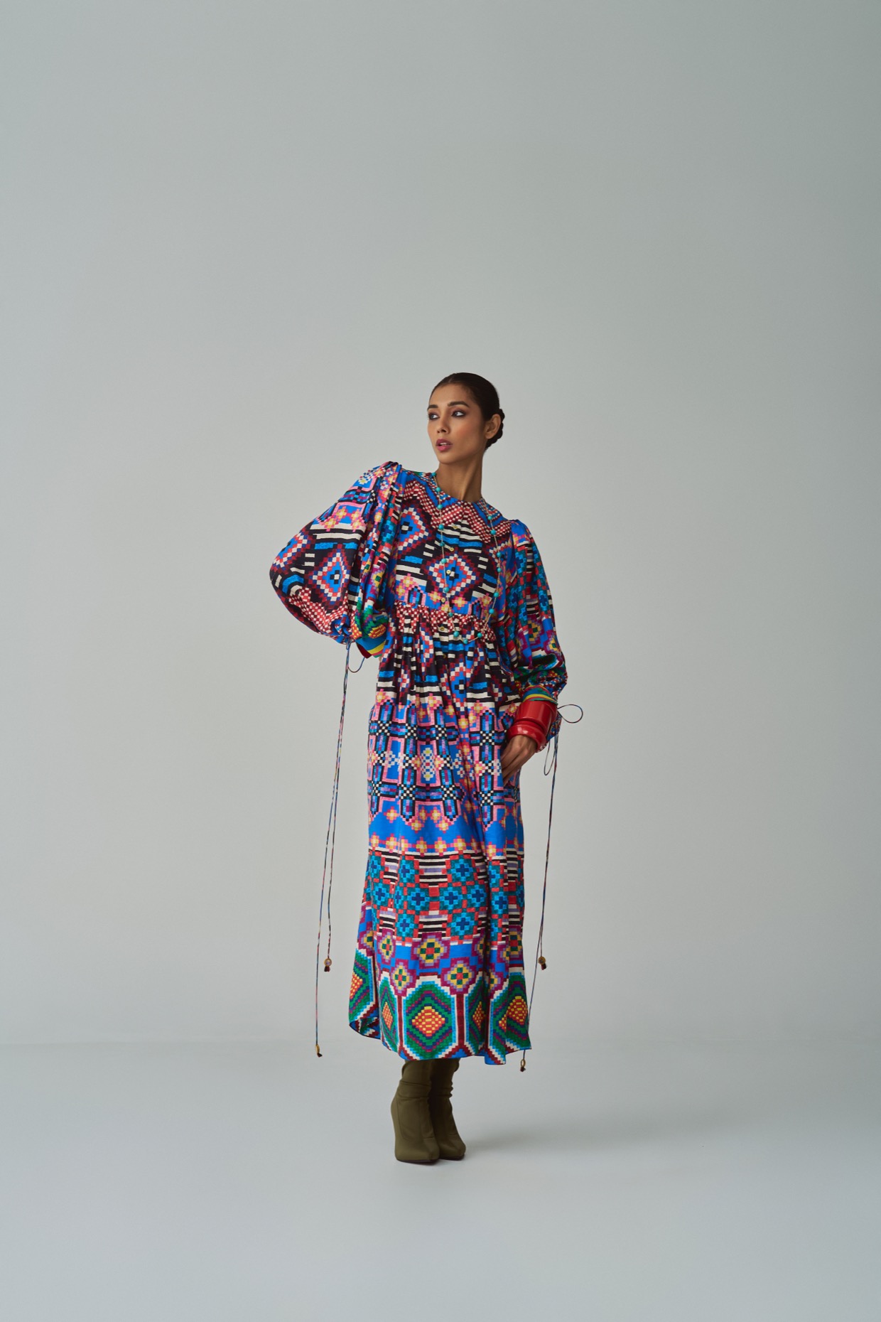A model showcasing Blue Sara Dress by Saaksha And Kinni from Saaksha And Kinni's collection