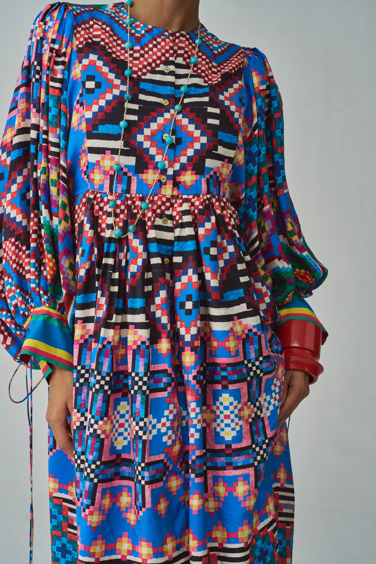 A model showcasing Blue Sara Dress by Saaksha And Kinni from Saaksha And Kinni's collection