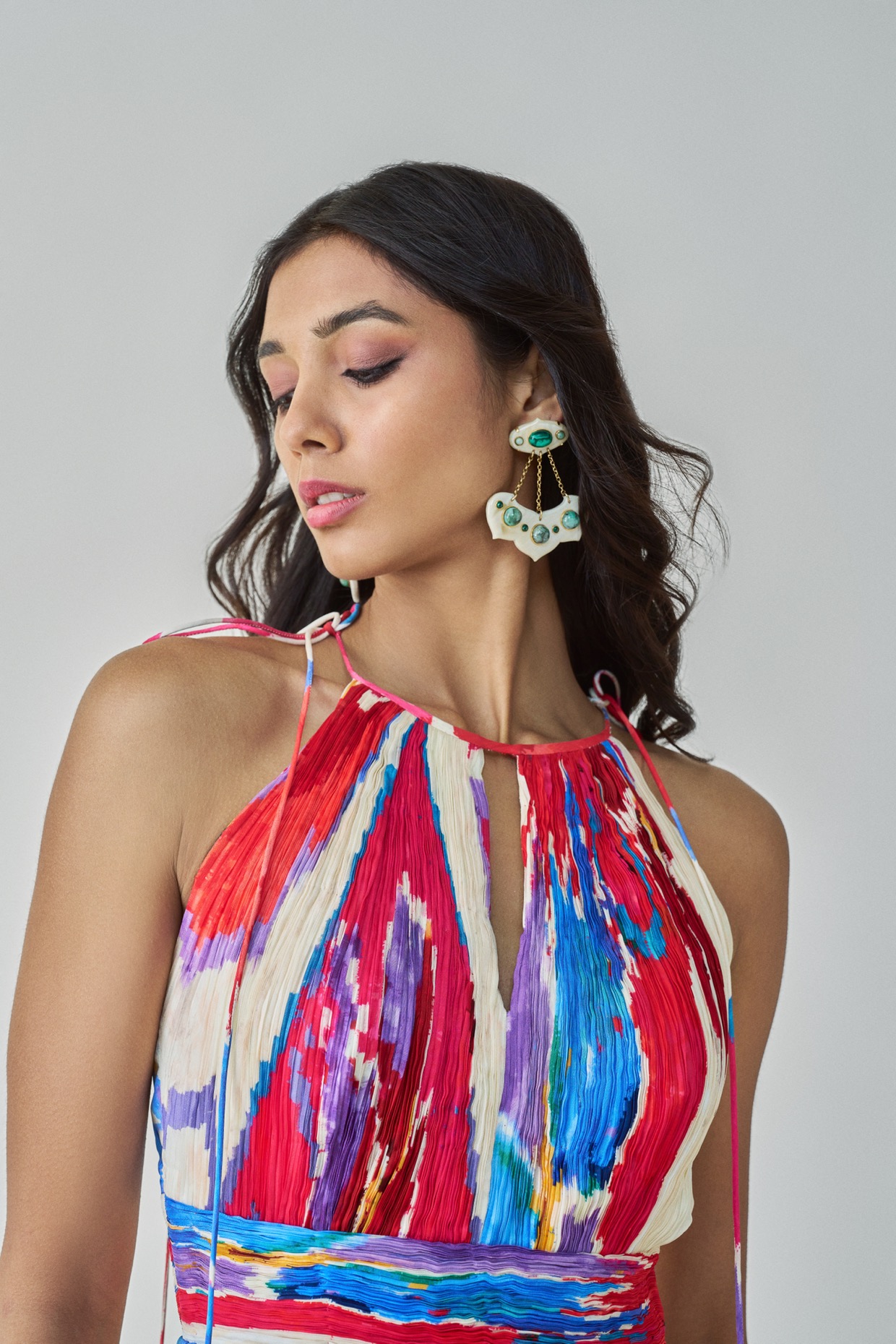 A model showcasing Jewel Dress Halter Neck Maxi Dress by Saaksha And Kinni from Saaksha And Kinni's collection