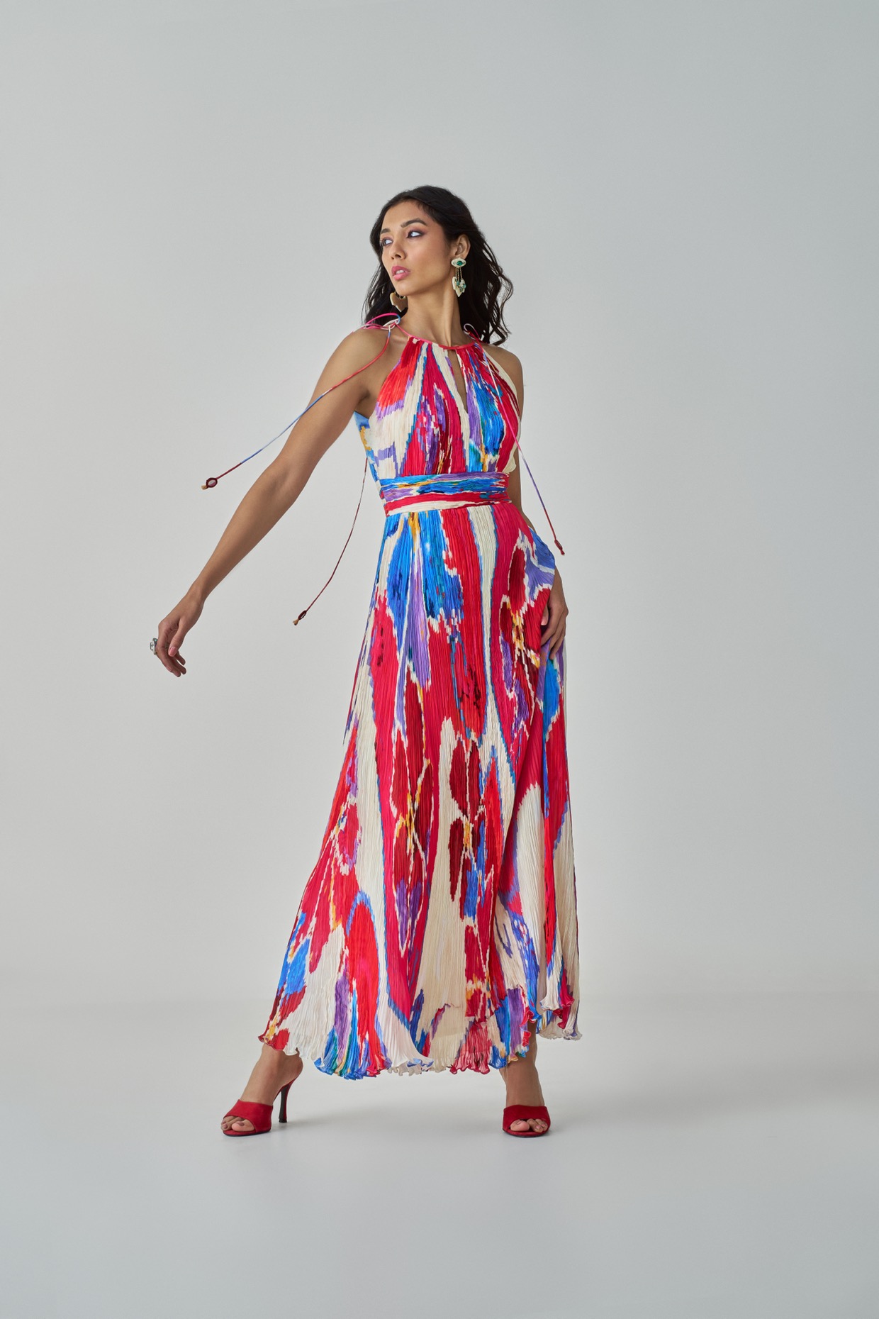 A model showcasing Jewel Dress Halter Neck Maxi Dress by Saaksha And Kinni from Saaksha And Kinni's collection
