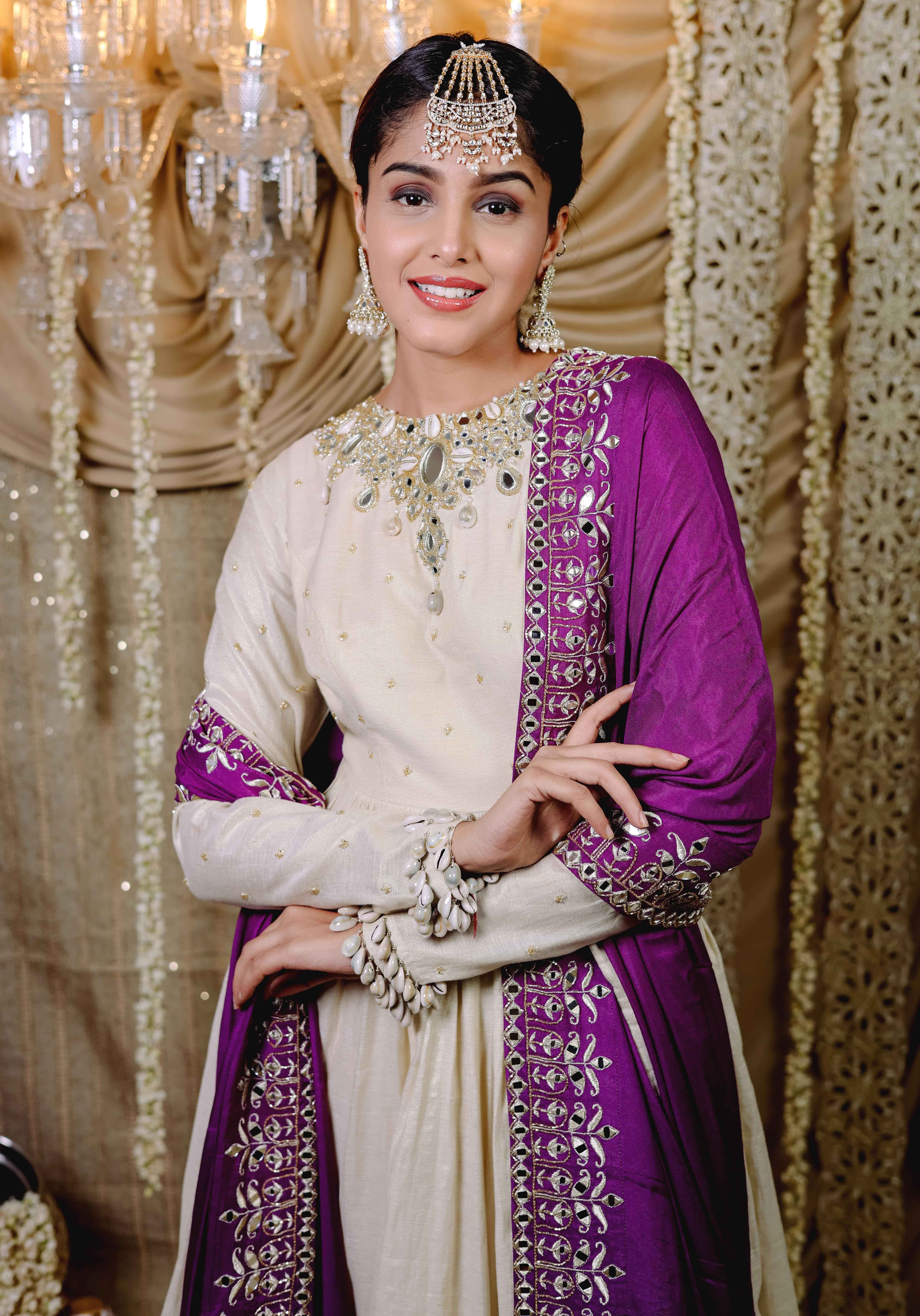 A model showcasing Ivory Embroidered Anarkali Dupatta Set by Foram Patel from Foram Patel's collection