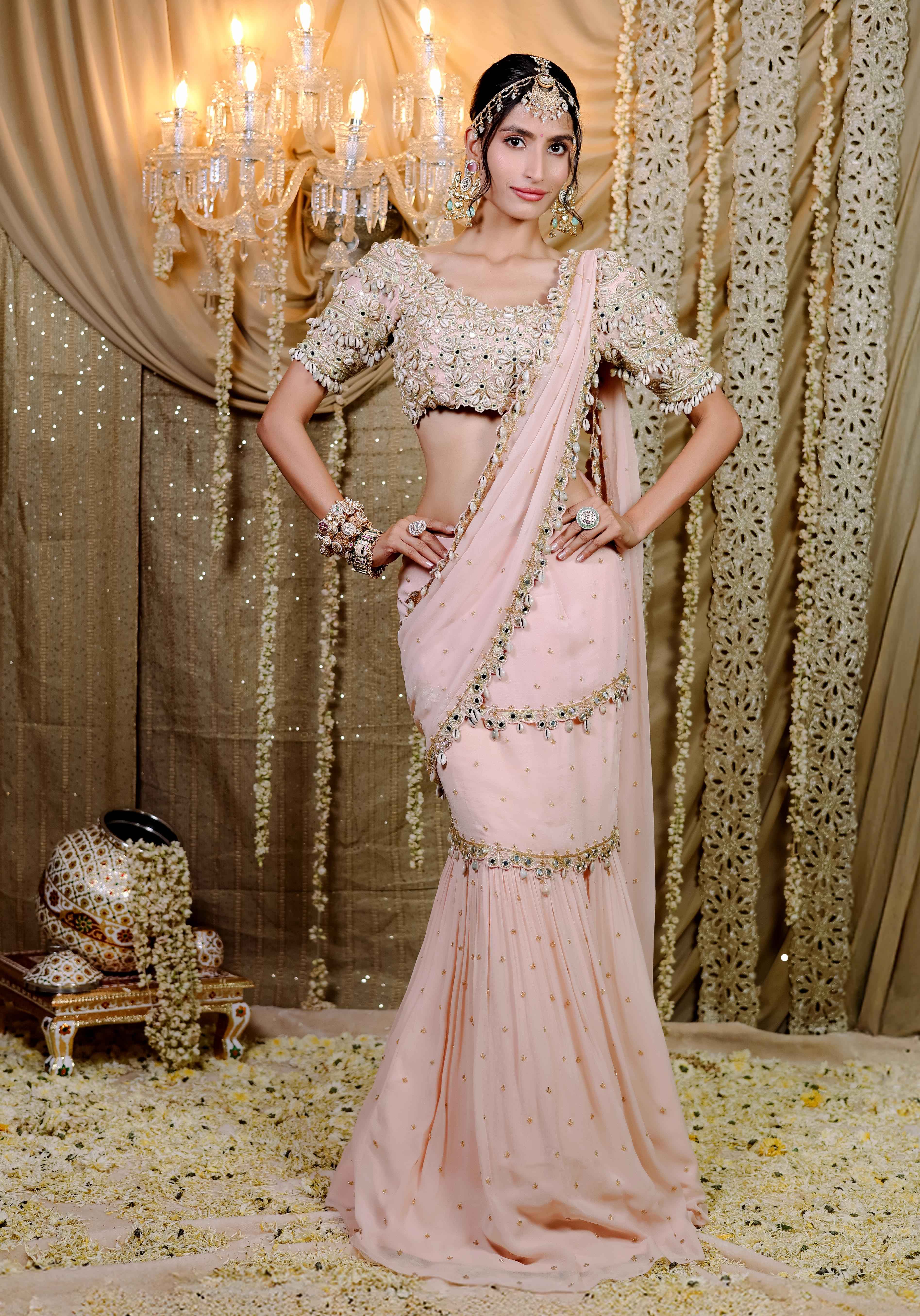 A model showcasing Peach Embroidered Mumtaz Saree Set Feature image by Foram Patel from Foram Patel's collection