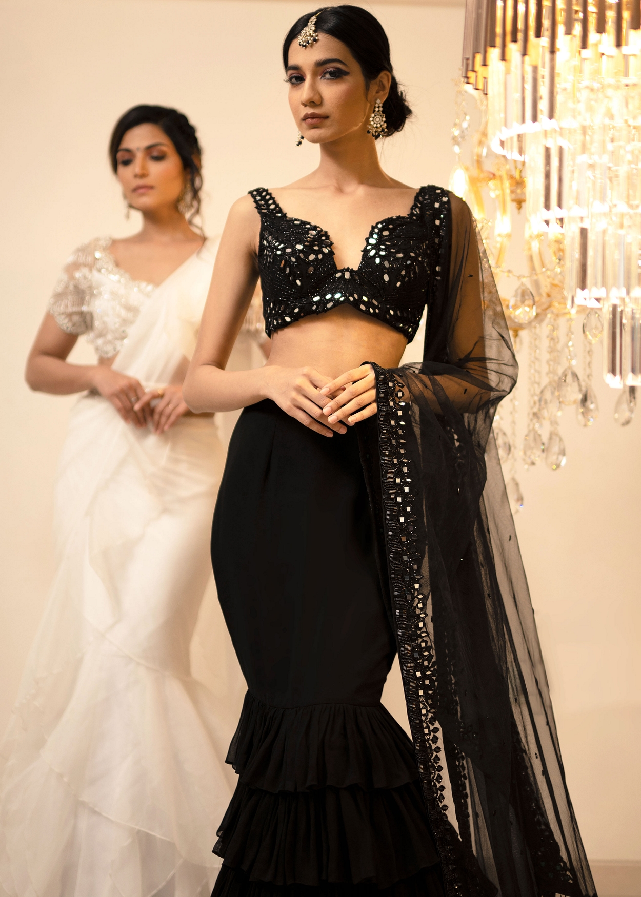 A model showcasing Black Ruffle Lehenga Set Feature image by Foram Patel from Foram Patel's collection