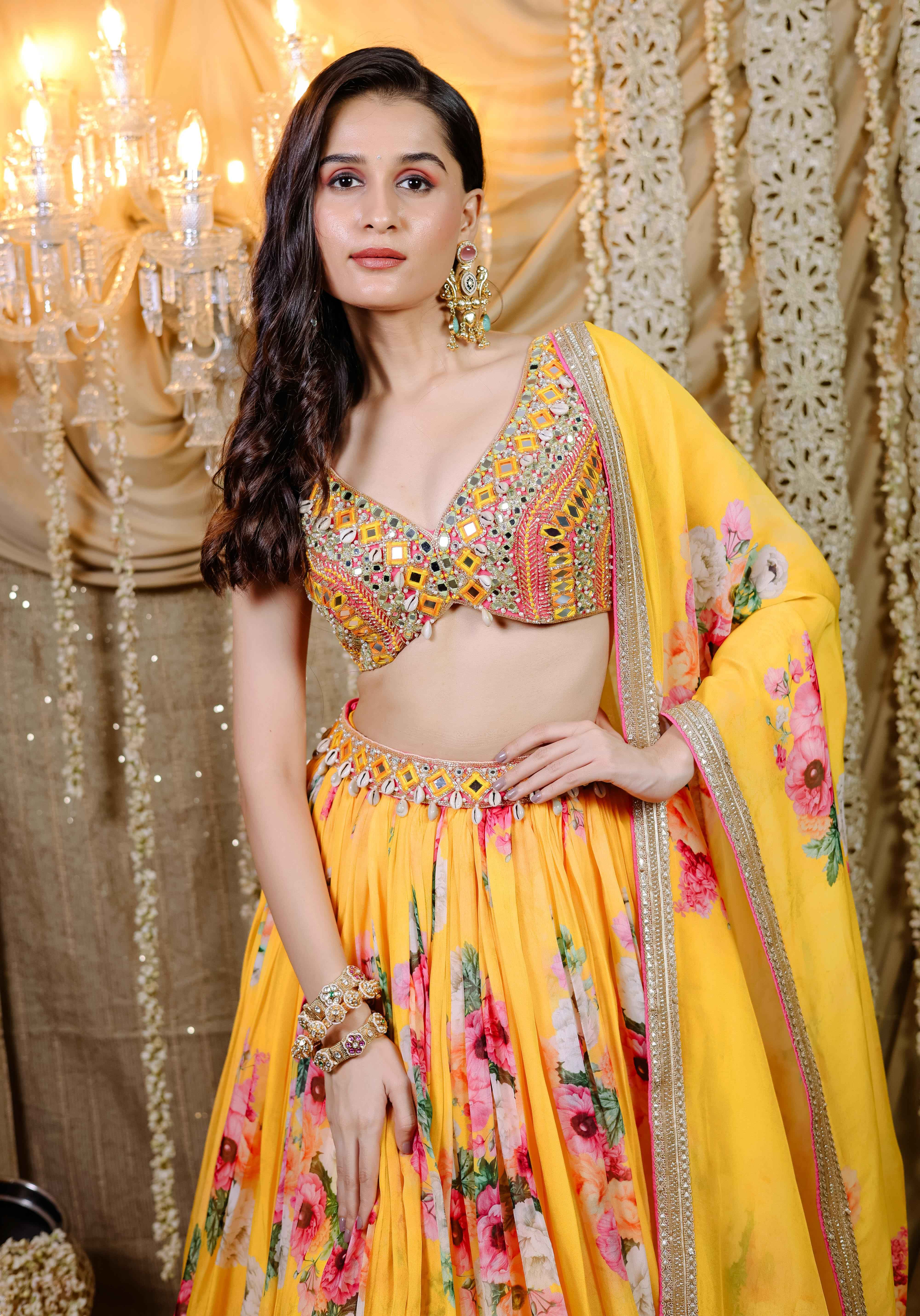A model showcasing Yellow Floral Printed Lehenga Set by Foram Patel from Foram Patel's collection