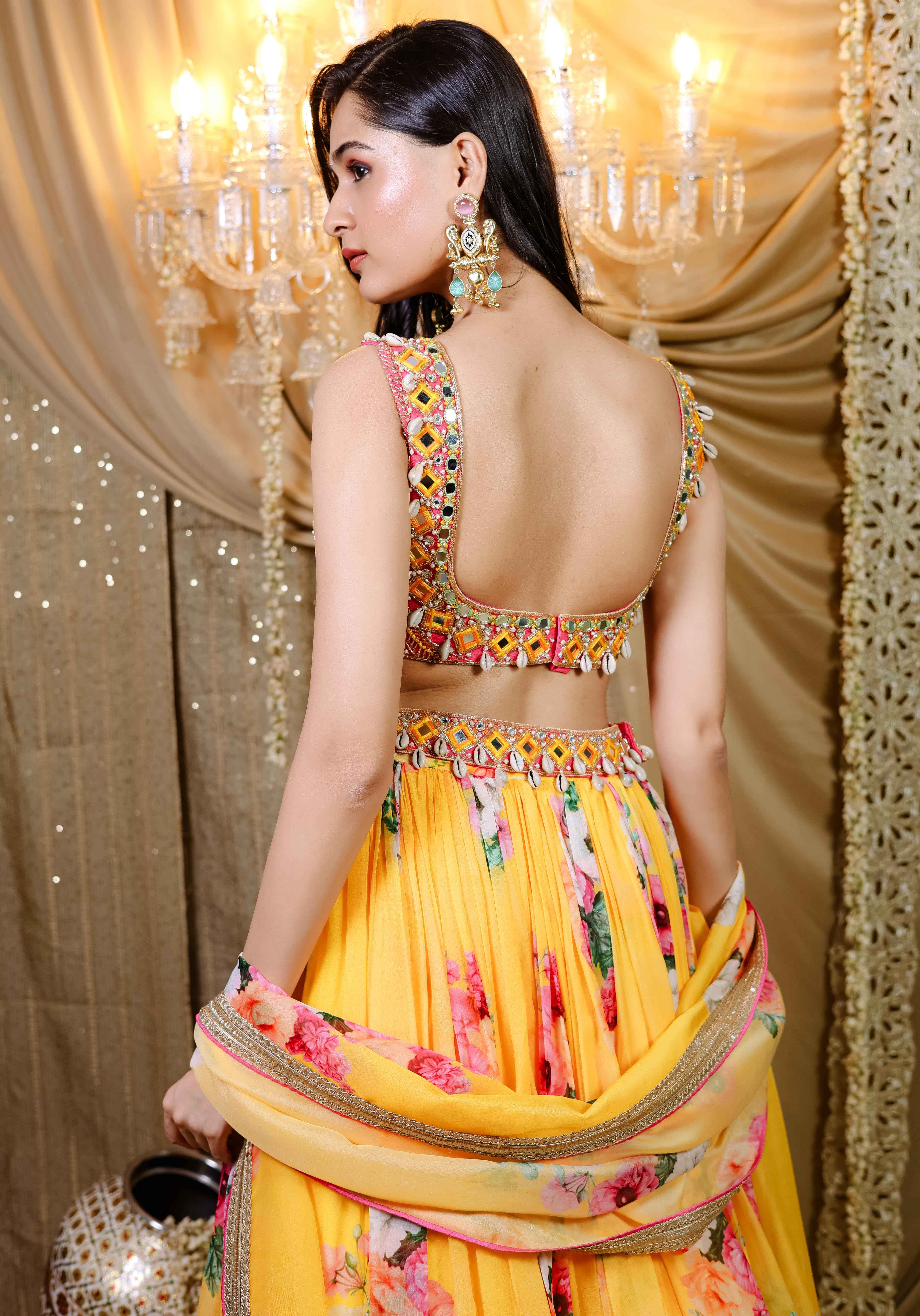 A model showcasing Yellow Floral Printed Lehenga Set by Foram Patel from Foram Patel's collection