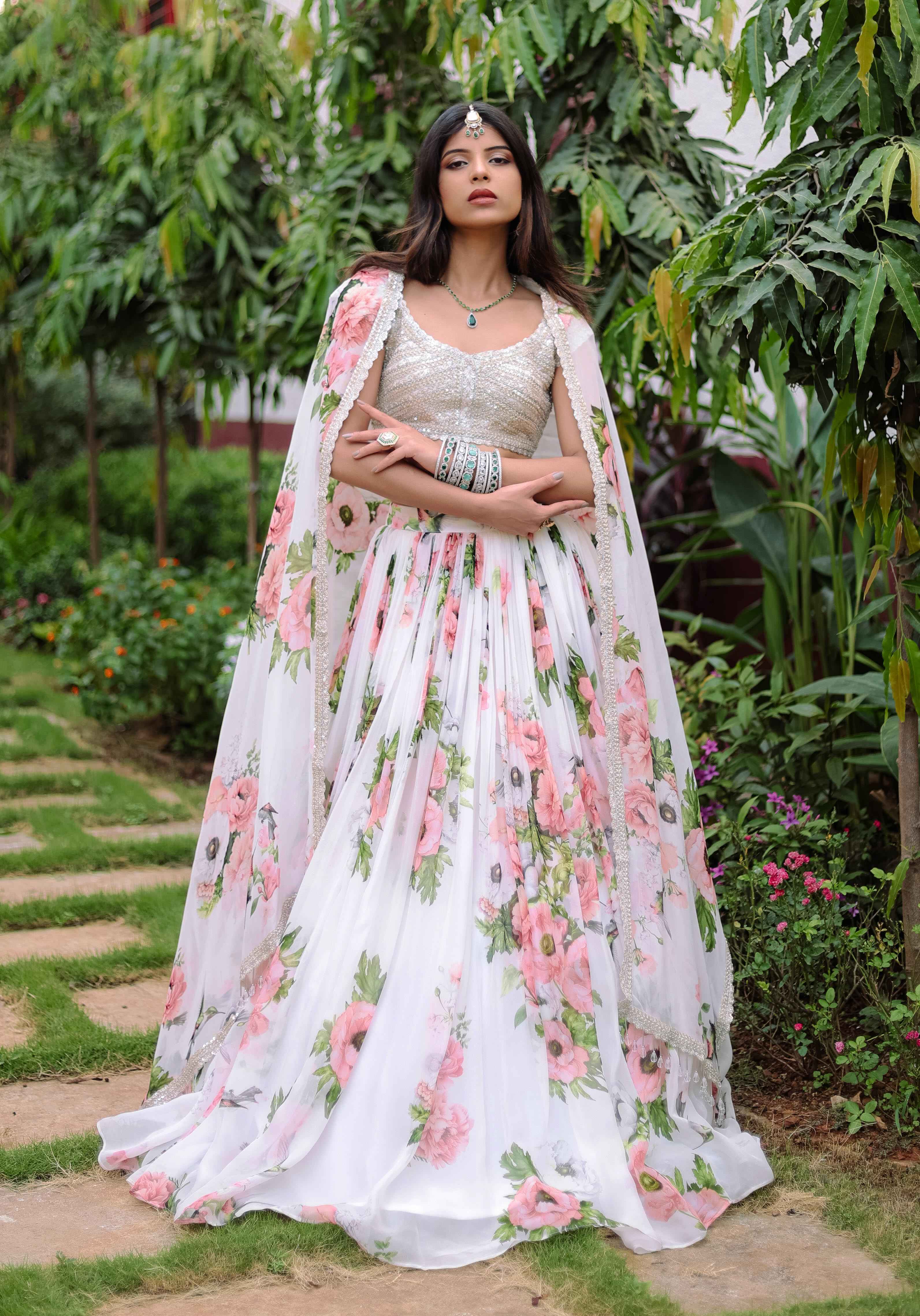 A model showcasing White Floral Printed Lehenga Set by Foram Patel from Foram Patel's collection