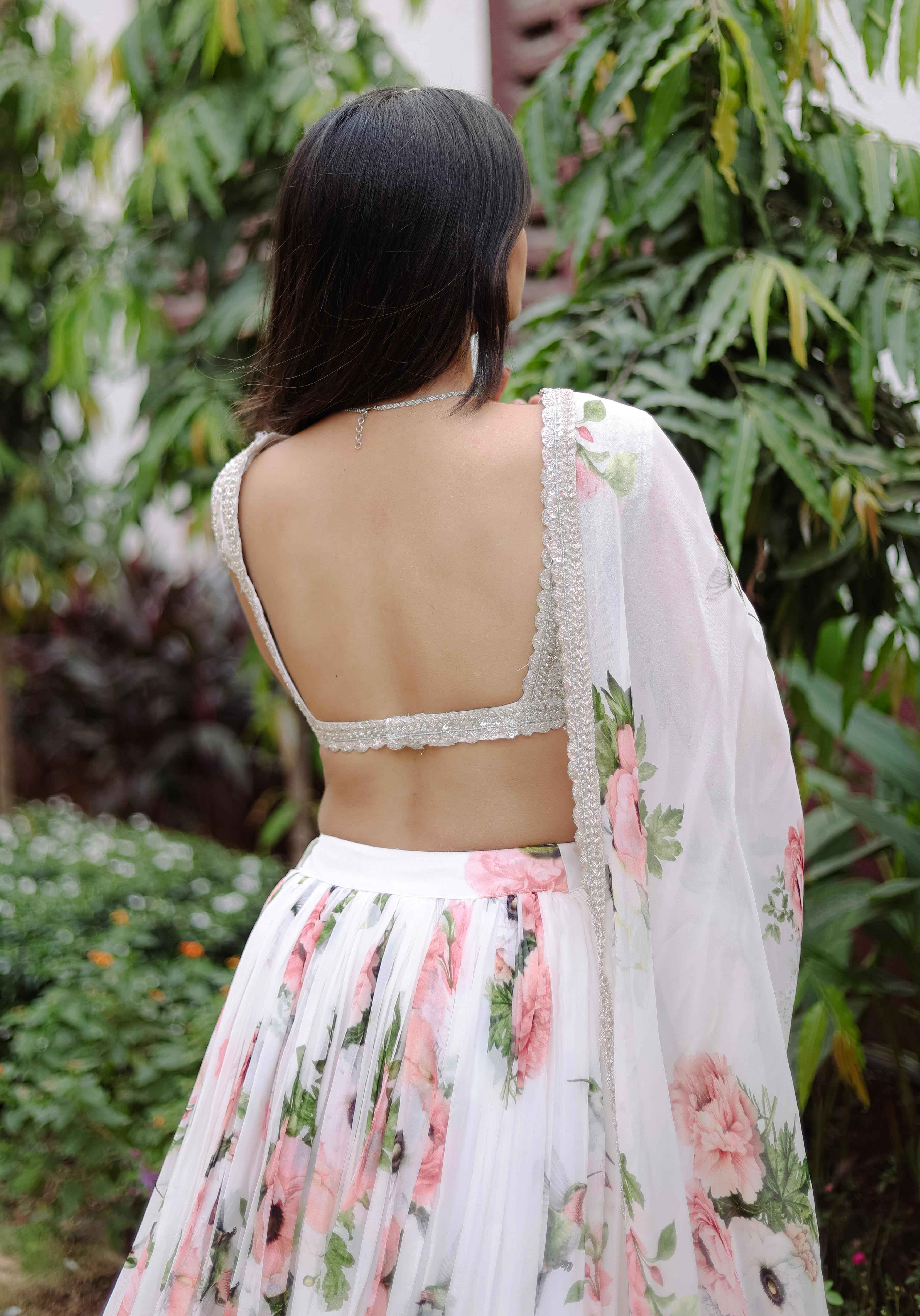 A model showcasing White Floral Printed Lehenga Set by Foram Patel from Foram Patel's collection