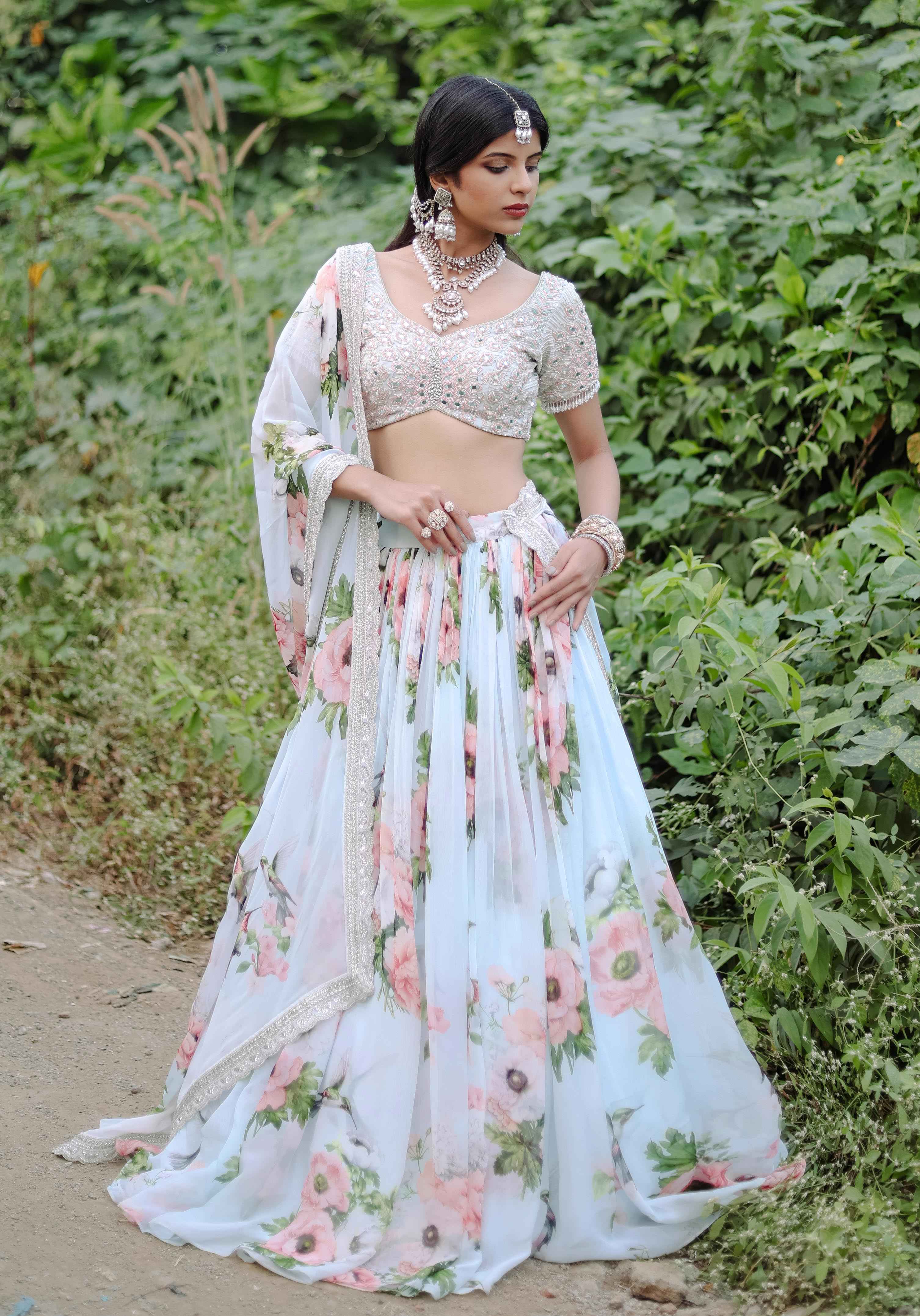 A model showcasing Sky Blue Floral Printed Lehenga Set by Foram Patel from Foram Patel's collection