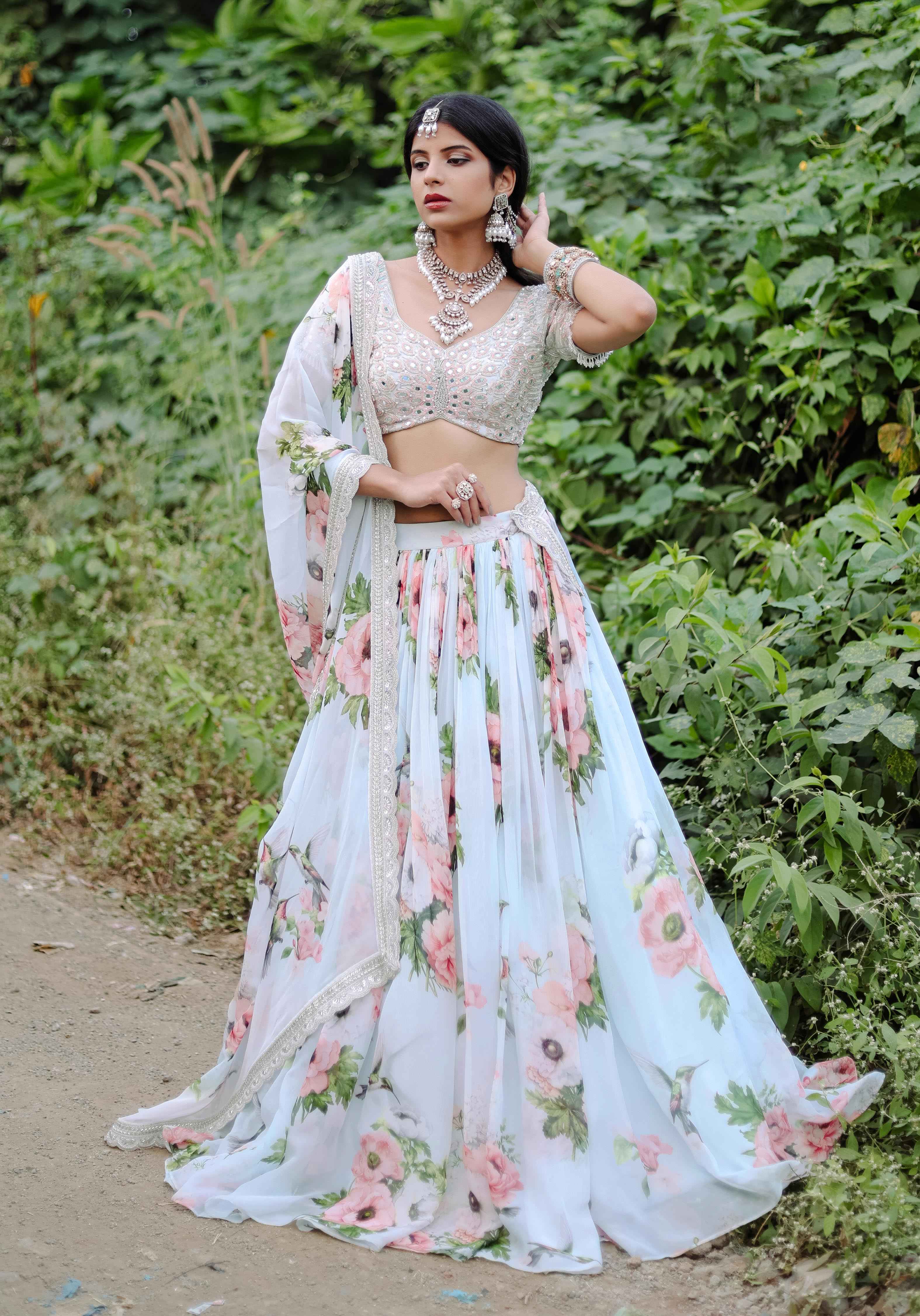 A model showcasing Sky Blue Floral Printed Lehenga Set by Foram Patel from Foram Patel's collection