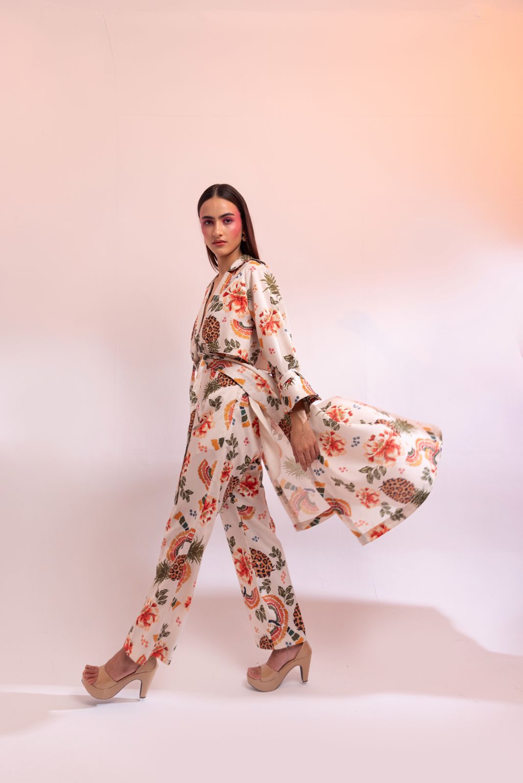 A model showcasing Parc Floral De Paris Trench Coat Pant Set by Miku Kumar from Miku Kumar's collection