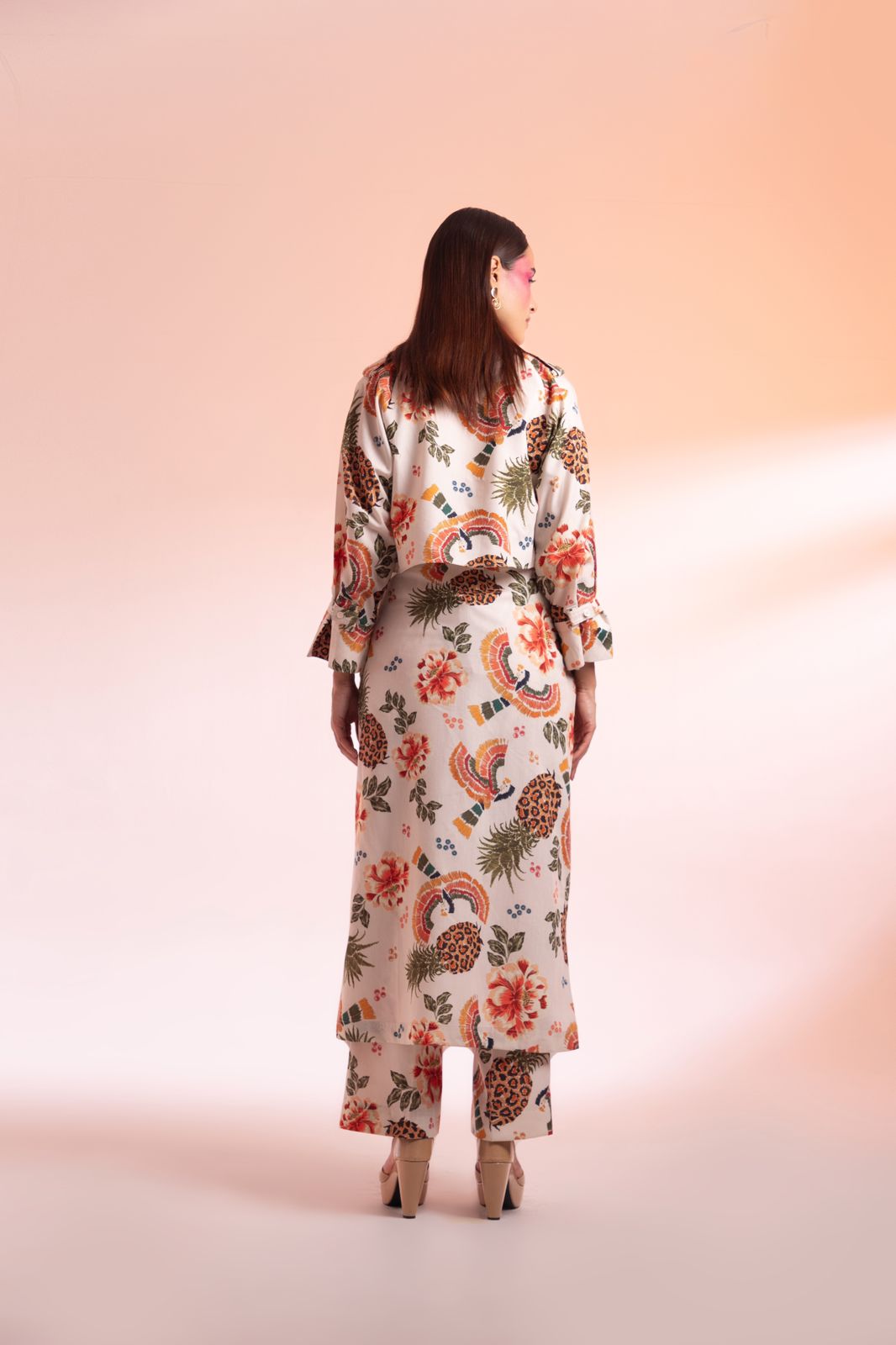 A model showcasing Parc Floral De Paris Trench Coat Pant Set by Miku Kumar from Miku Kumar's collection