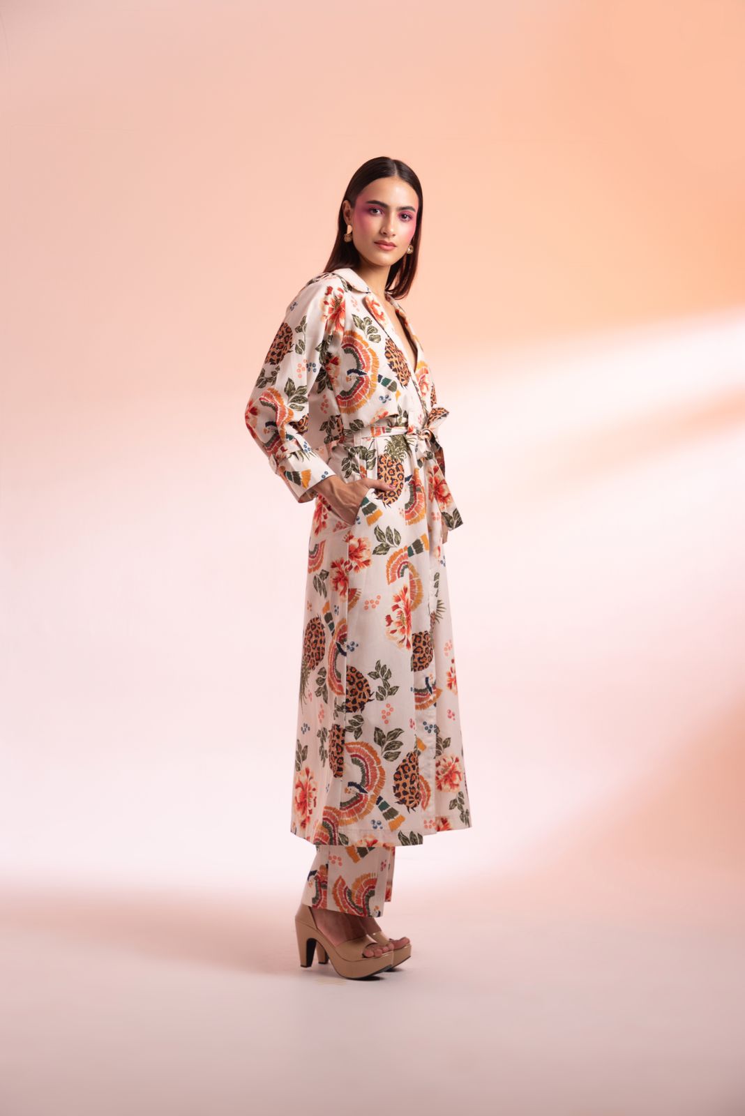A model showcasing Parc Floral De Paris Trench Coat Pant Set by Miku Kumar from Miku Kumar's collection