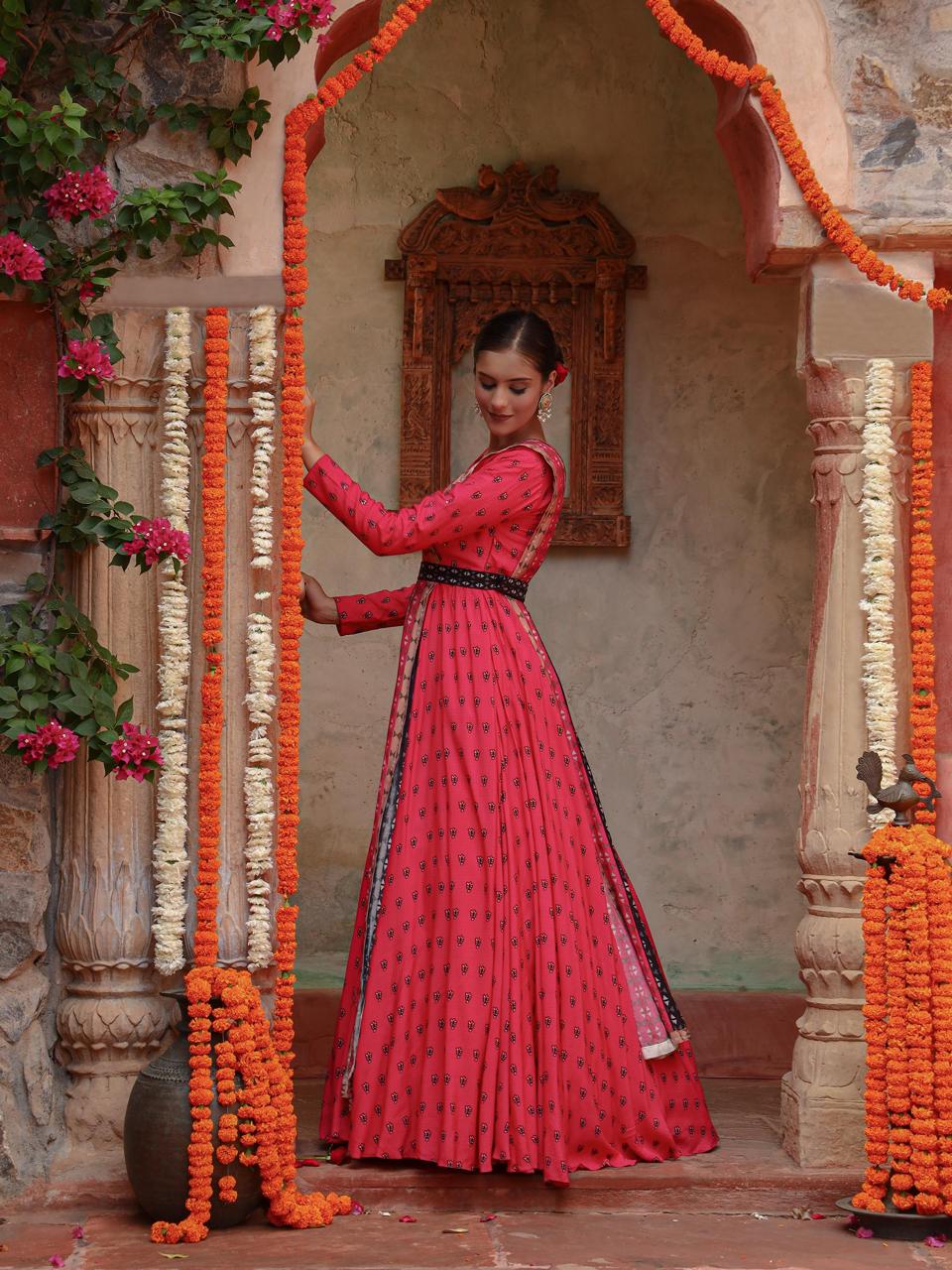 A model showcasing Divija Anarkali Set by Miku Kumar from Miku Kumar's collection