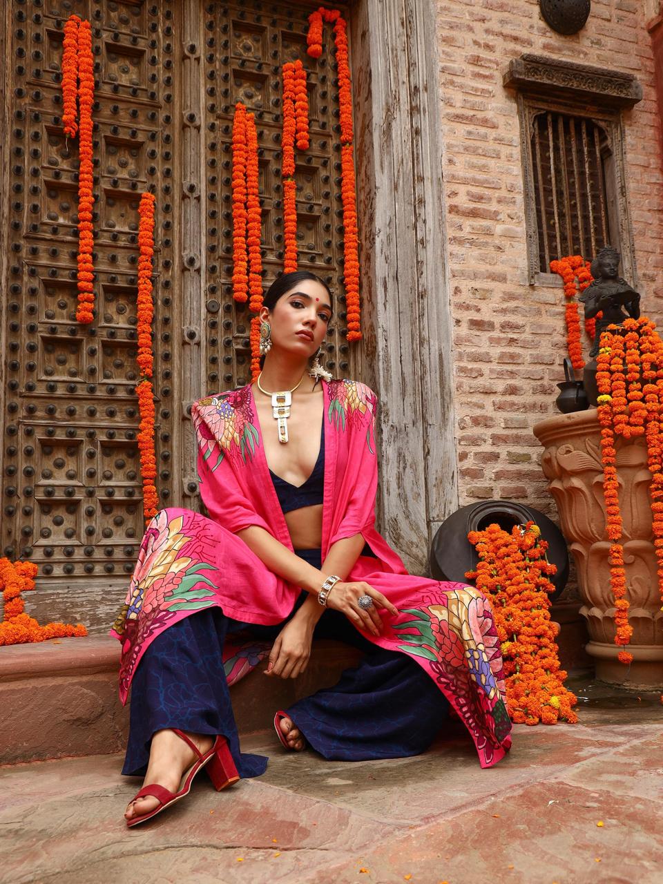 A model showcasing Zuhi Palazo Cape Indo Western Zset by Miku Kumar from Miku Kumar's collection