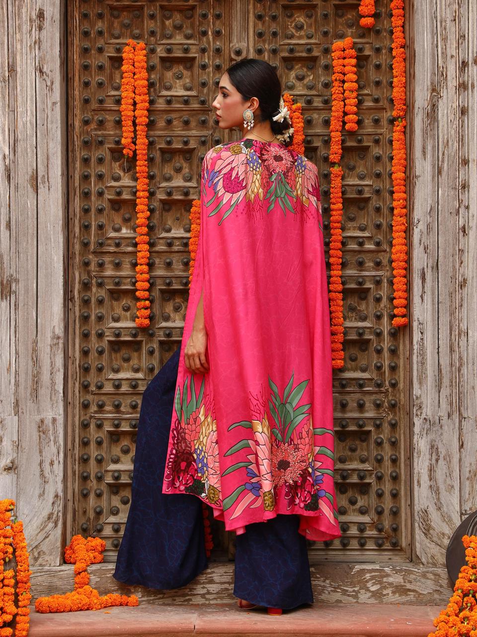 A model showcasing Zuhi Palazo Cape Indo Western Zset by Miku Kumar from Miku Kumar's collection