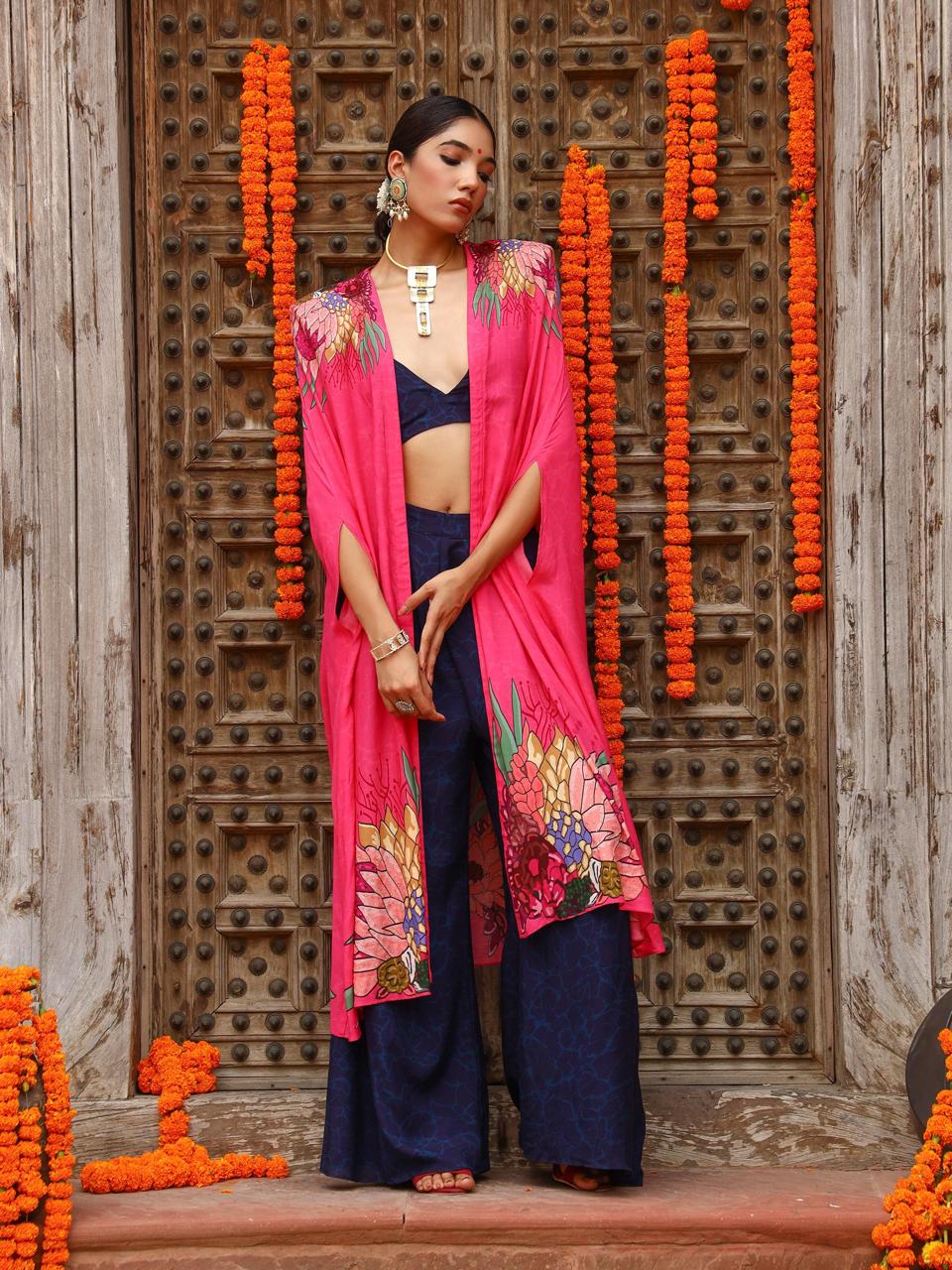 A model showcasing Zuhi Palazo Cape Indo Western Zset by Miku Kumar from Miku Kumar's collection