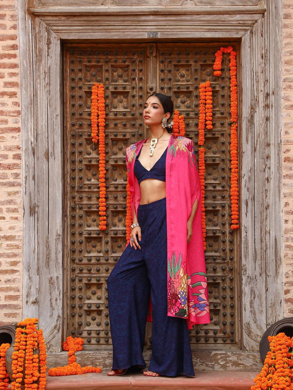 A model showcasing Zuhi Palazo Cape Indo Western Zset by Miku Kumar from Miku Kumar's collection
