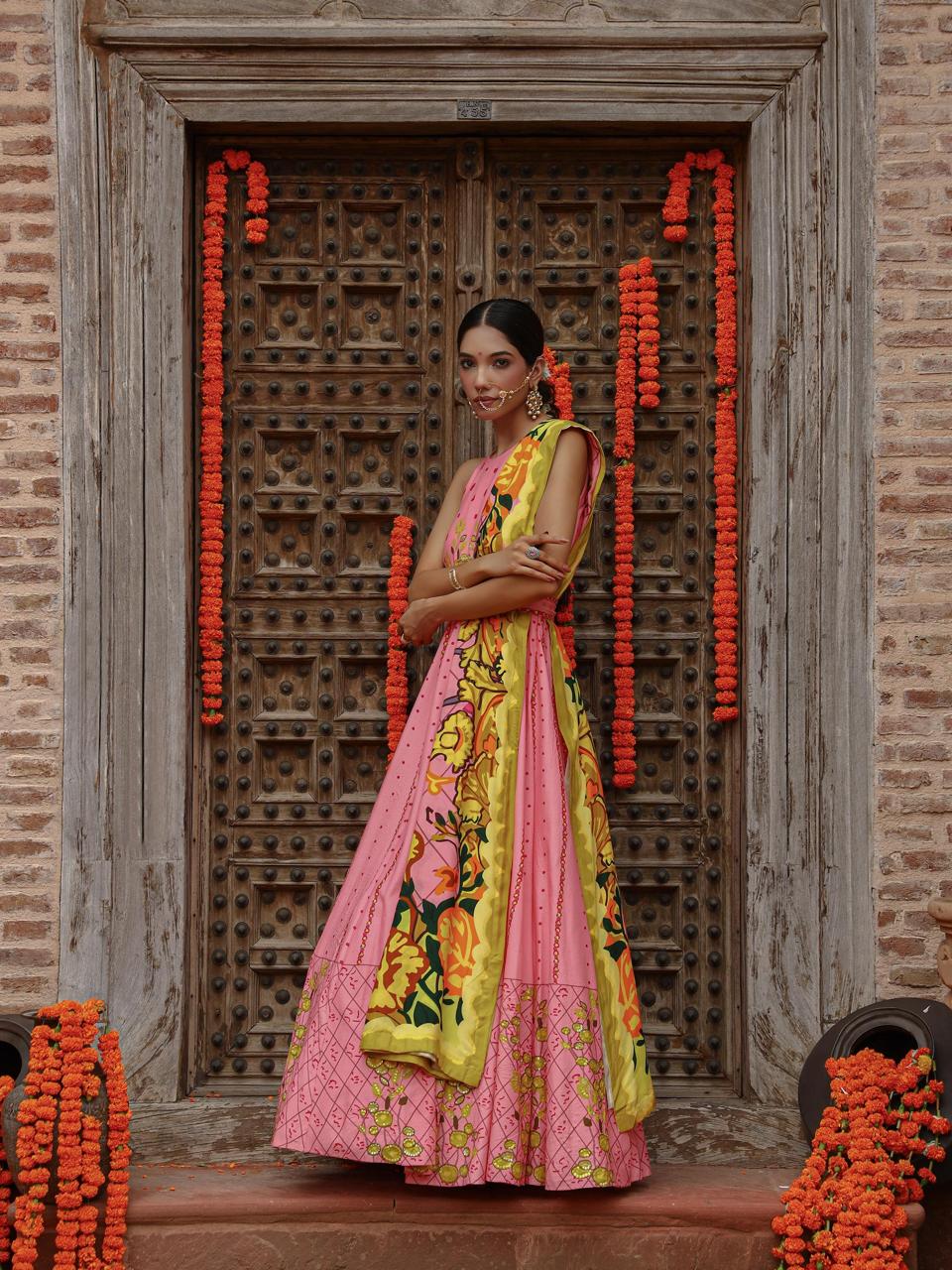 A model showcasing Kaira Anarkali Set by Miku Kumar from Miku Kumar's collection
