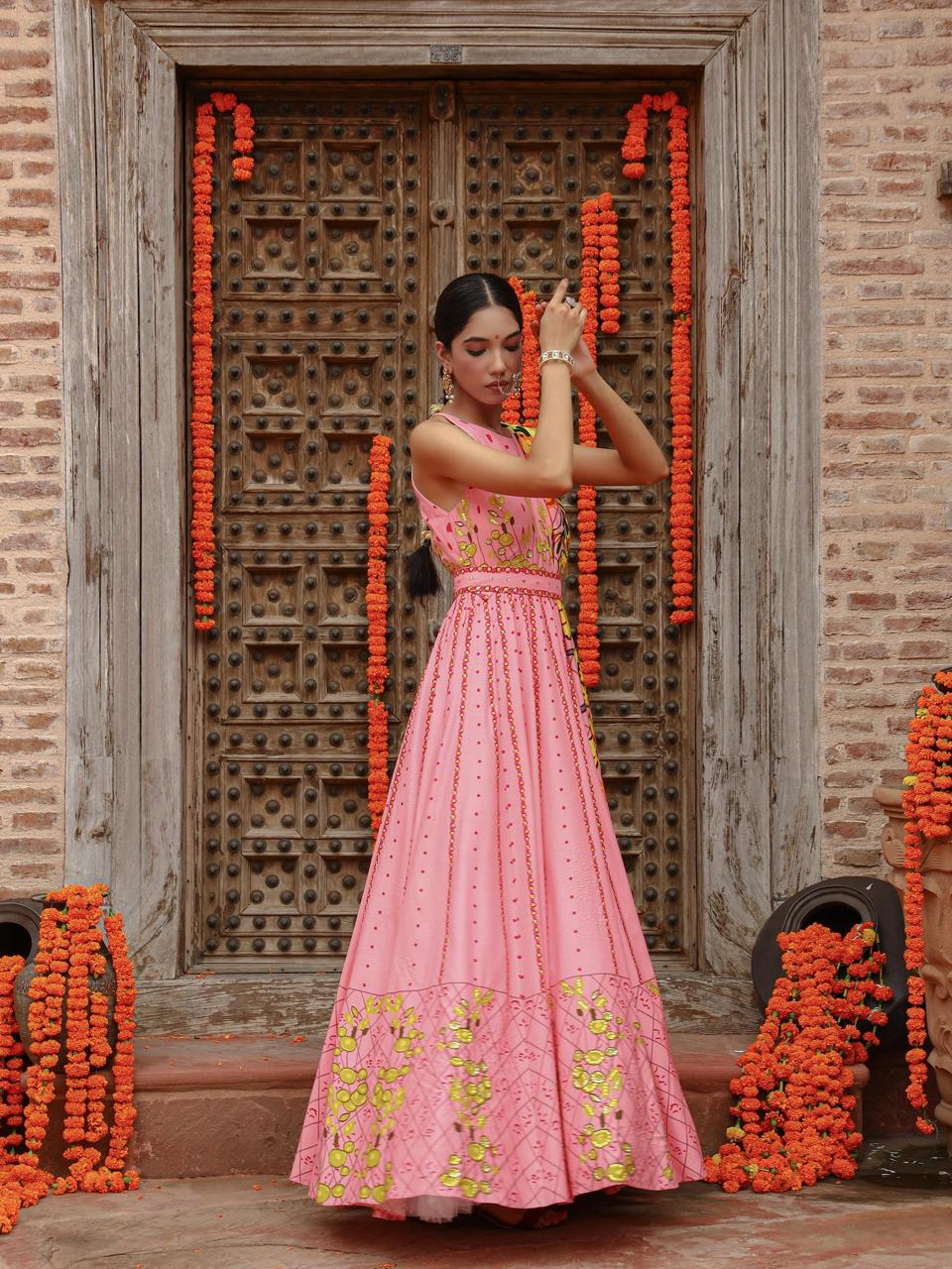 A model showcasing Kaira Anarkali Set by Miku Kumar from Miku Kumar's collection