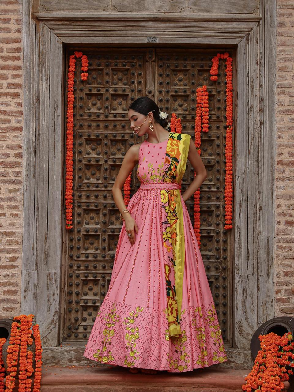 A model showcasing Kaira Anarkali Set by Miku Kumar from Miku Kumar's collection