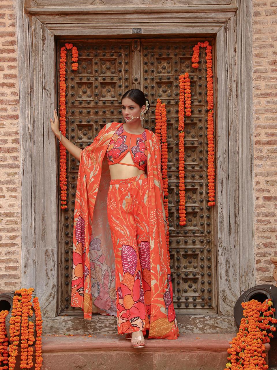 A model showcasing Keya Palazzo Cape Set by Miku Kumar from Miku Kumar's collection