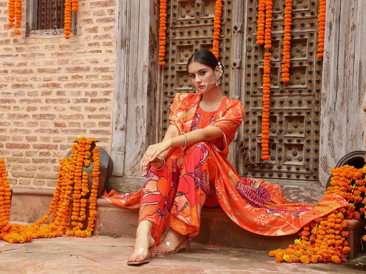 A model showcasing Keya Palazzo Cape Set by Miku Kumar from Miku Kumar's collection